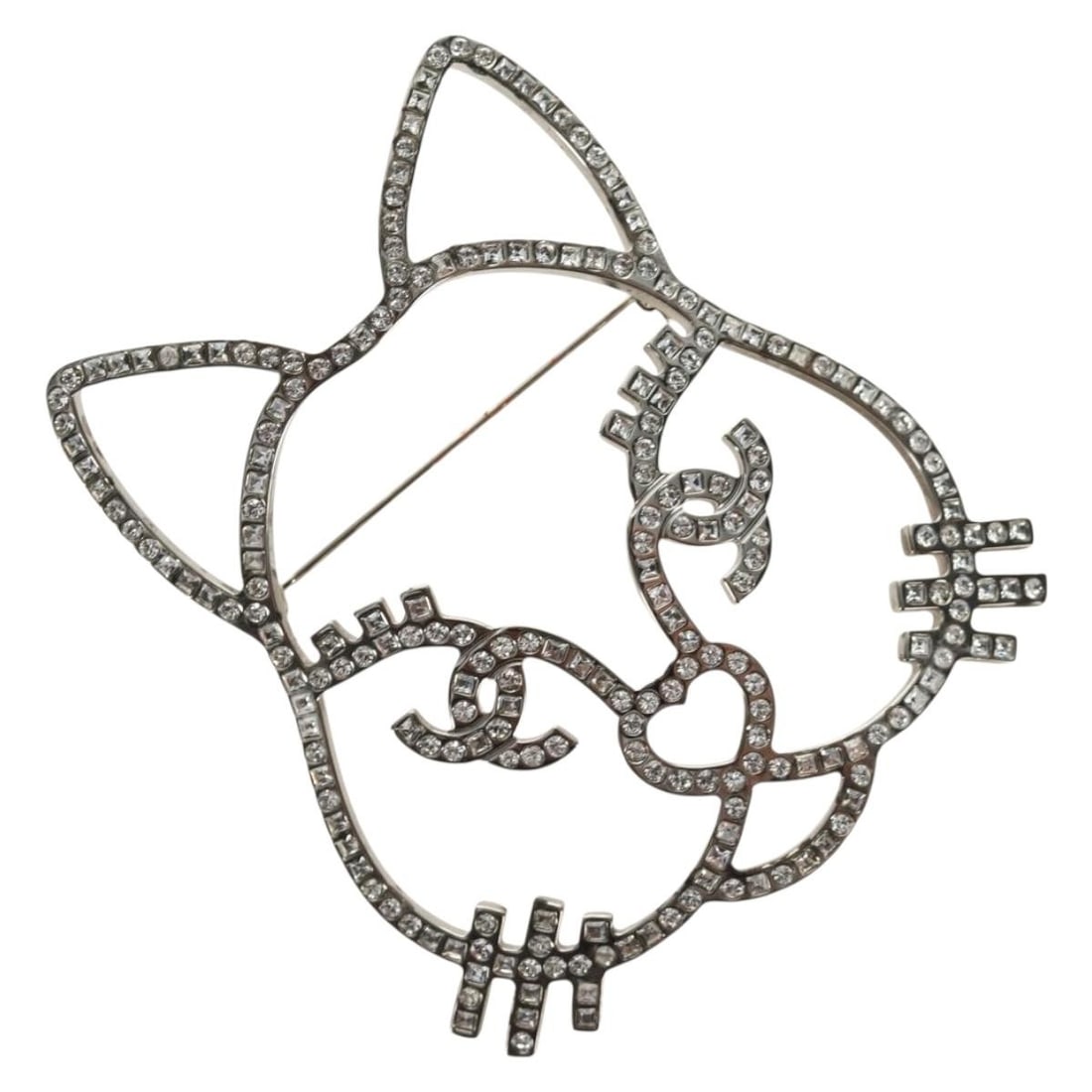 CHANEL CC Silver Metal Brooch Made in Italy: CHANEL CC Silver Metal Brooch Made in Italy A CHANEL brooch in silver metal, made in Italy. It comes with an item box and is described as being in very good condition, with slight dirt on the metal fi