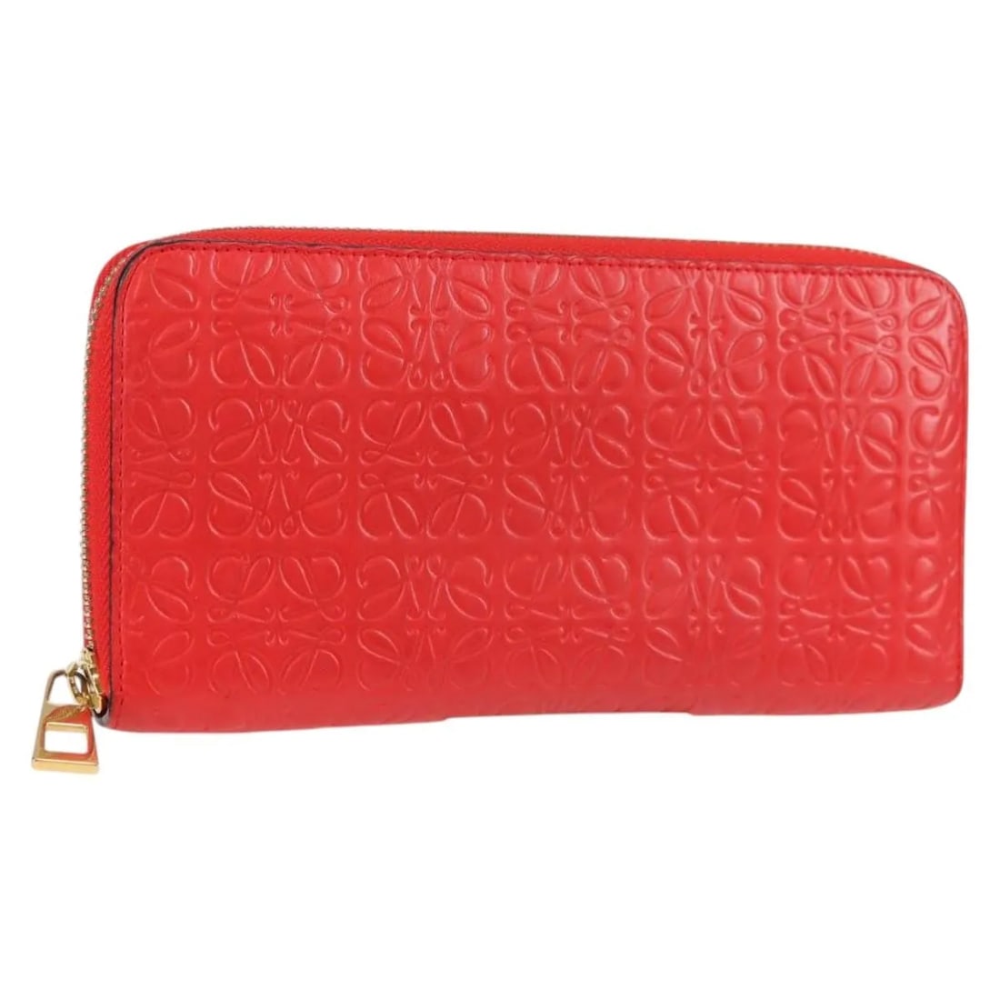 Loewe Anagram Red Leather Wallet: Loewe Anagram Red Leather Wallet This red leather Anagram wallet by Loewe is designed for women, featuring a compact size with dimensions of 19cm width, 9.5cm height, and 2cm length. Crafted in Spain,
