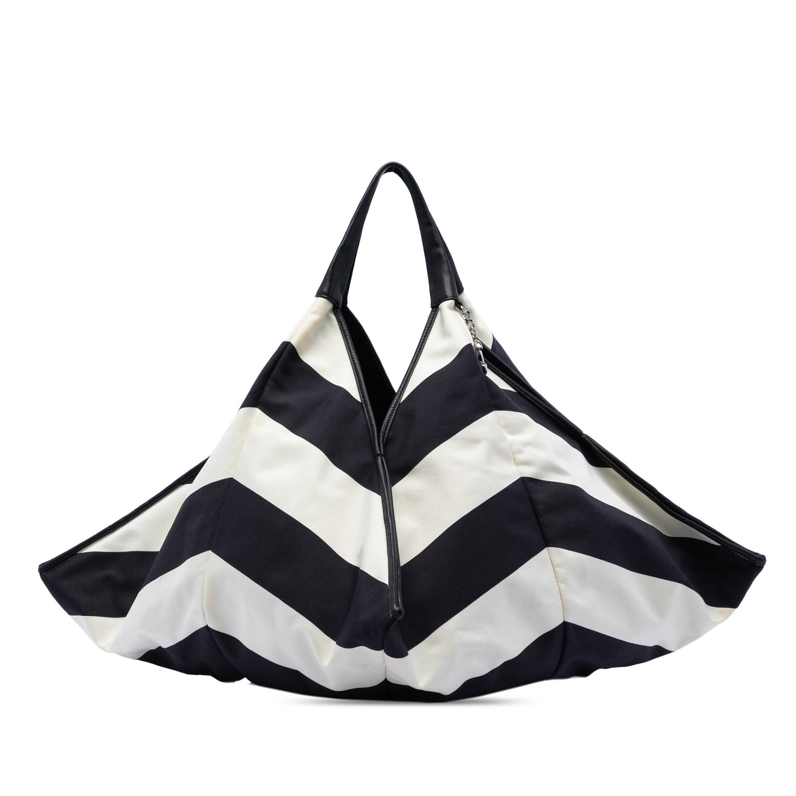 Chanel Black Canvas Stripe Tote Bag with Leather Trim: Chanel Black Canvas Stripe Tote Bag with Leather Trim This Chanel CC Canvas Stripe Tote features a canvas body with leather trim, rolled leather straps, and an open top. The bag is crafted in Italy an
