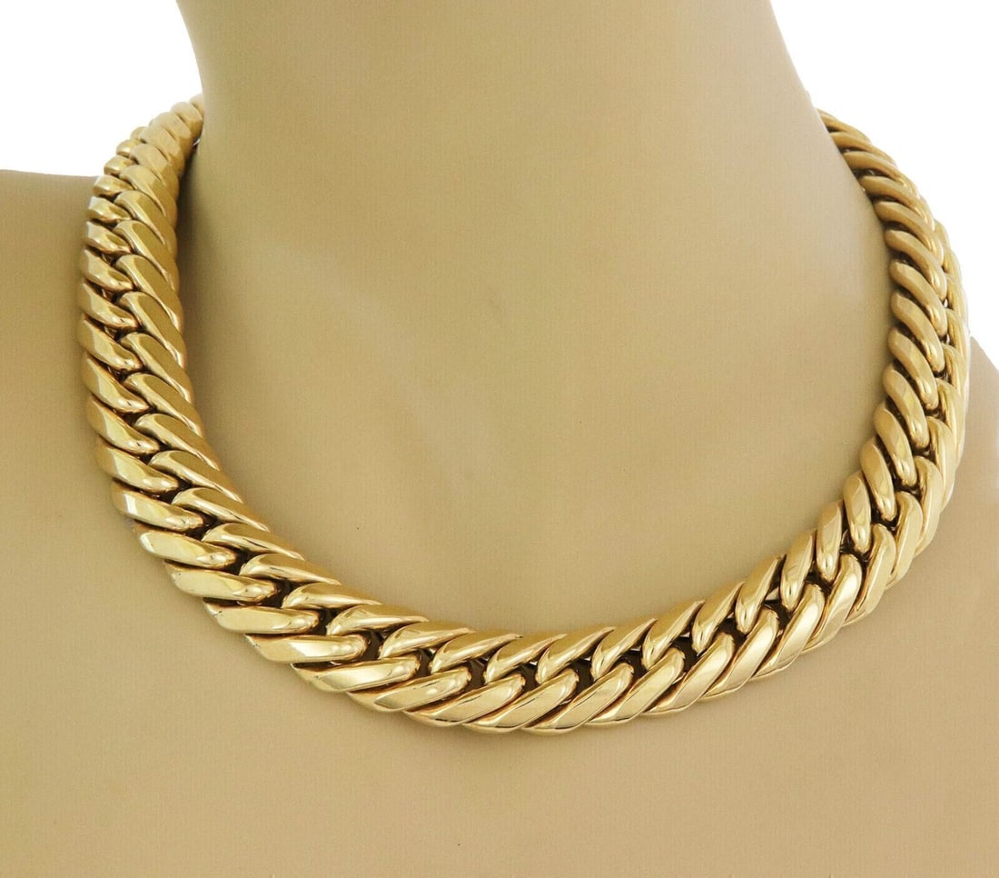 Mayor's 18k Yellow Gold Choker Necklace Beveled Curb Link: Mayor's 18k Yellow Gold Choker Necklace Beveled Curb Link This pre-owned Mayor's necklace is crafted in 18k yellow gold and features a bold beveled curb link design in a choker-style silhouette. It is