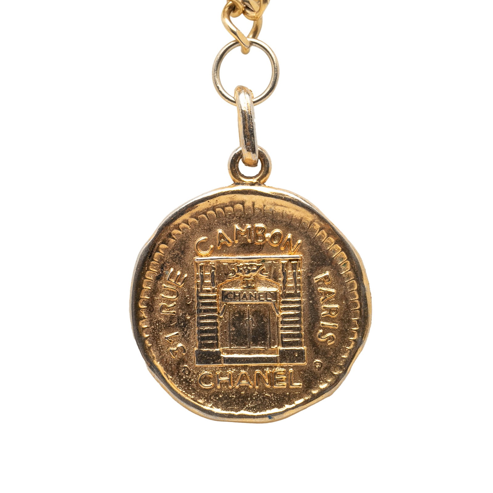Chanel 31 Rue Cambon medallion pendant necklace gold tone metal: Chanel 31 Rue Cambon medallion pendant necklace gold tone metal This Chanel Gold Plated 31 Rue Cambon Medallion Pendant Necklace features a gold-tone metal construction and a spring ring closure. The 