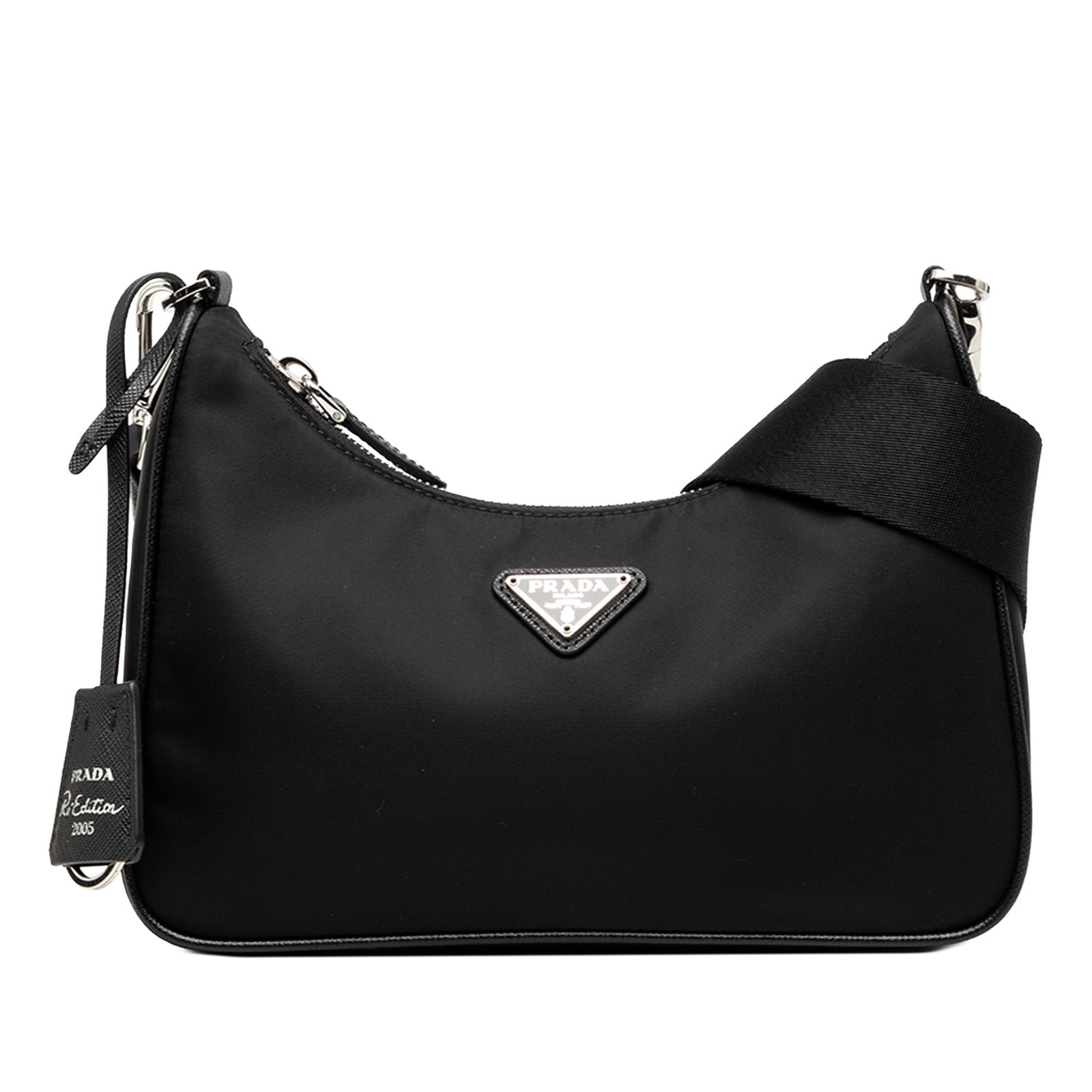 Prada Re Edition 2005 Nylon Satchel with Saffiano Trim: Prada Re Edition 2005 Nylon Satchel with Saffiano Trim Prada Re-Nylon Re-Edition 2005 satchel in black, featuring a nylon body with Saffiano trim, a detachable and adjustable flat canvas strap, and a 