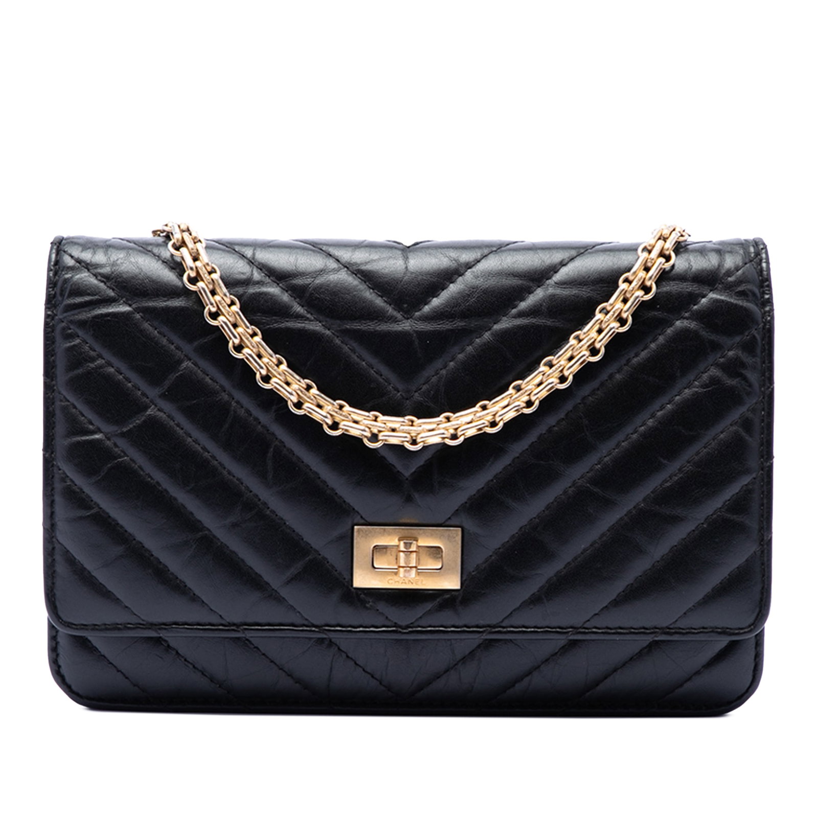 Chanel Reissue 2.55 Chevron Wallet on Chain Black Leather: Chanel Reissue 2.55 Chevron Wallet on Chain Black Leather This Chanel Reissue 2.55 Chevron Wallet on Chain is crafted from aged calfskin leather in black and features a chevron pattern. It is designed