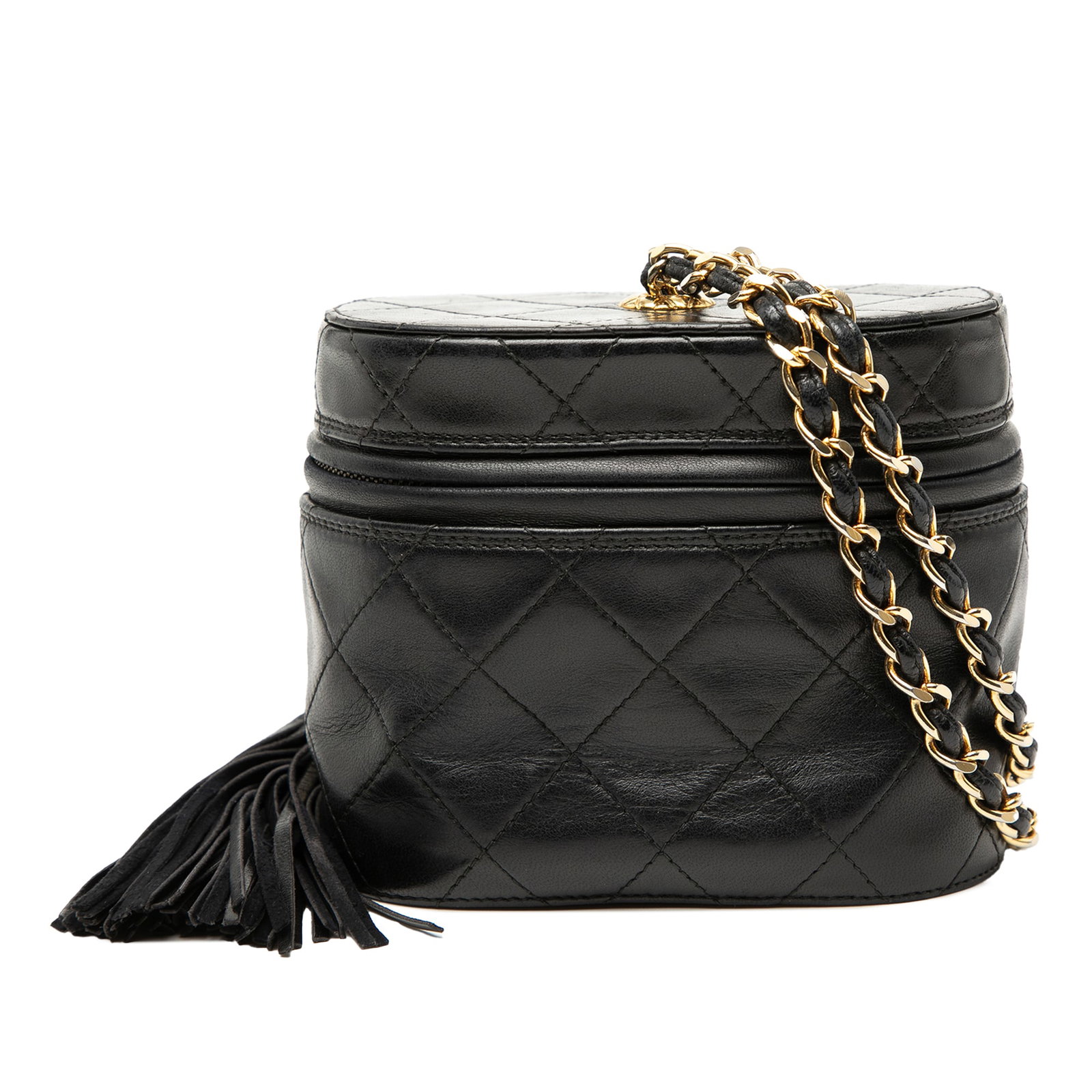Black Lambskin Quilted Vanity Bag with Chain and Tassel by Chanel: Black Lambskin Quilted Vanity Bag with Chain and Tassel by Chanel This Chanel vanity case features a quilted lambskin leather body in black, complemented by a leather-woven chain strap and a zip-aroun