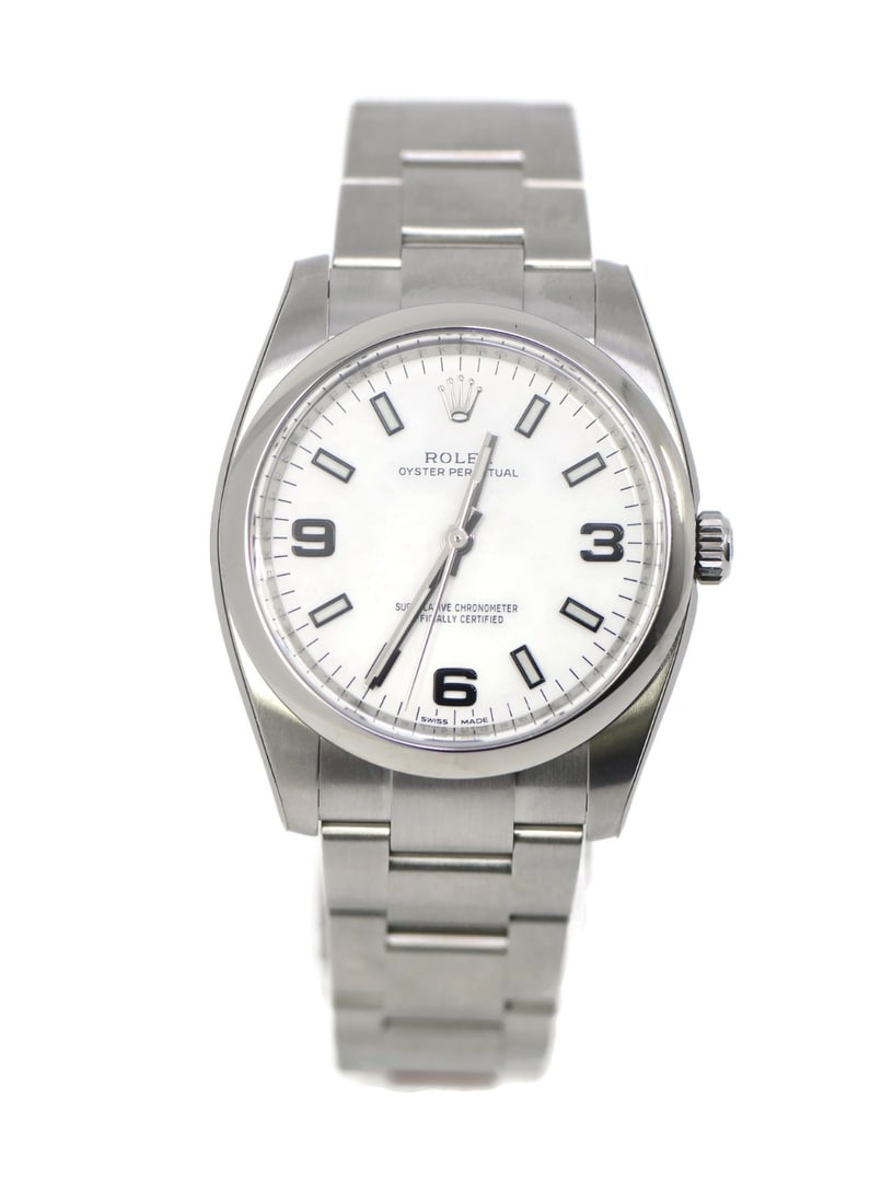 Rolex Oyster Perpetual 114200 Stainless Steel Automatic Watch with Box and Papers: Rolex Oyster Perpetual 114200 Stainless Steel Automatic Watch with Box and Papers Experience the elegance of the Rolex Oyster Perpetual Stainless Steel Watch, Model 114200. This sophisticated wristwat