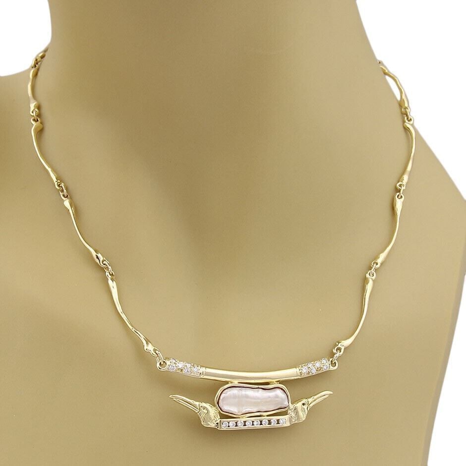 Anthony Kim Bird Pendant Necklace 18k Yellow Gold Pearl Diamond Collar: Anthony Kim Bird Pendant Necklace 18k Yellow Gold Pearl Diamond Collar This Anthony Kim collar necklace features a bird pendant design crafted in 18k yellow gold with diamond and pearl accents. The ne
