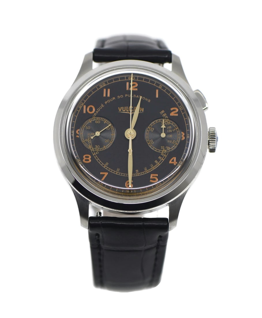 Vulcain Monopusher Heritage 39mm Stainless Steel Wristwatch With Box: Vulcain Monopusher Heritage 39mm Stainless Steel Wristwatch With Box This Vulcain Monopusher Heritage wristwatch features a polished stainless steel case with a round shape and a 39mm diameter. It is 