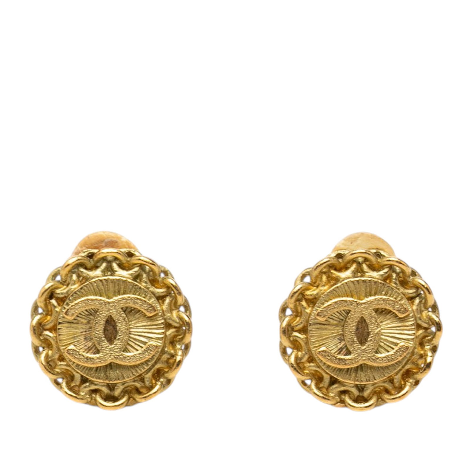 Round Clip On Earrings Chanel CC Gold Plated: Round Clip On Earrings Chanel CC Gold Plated Round Chanel clip-on earrings with a gold-plated finish and CC design. This costume jewelry pair is made in France and includes the box. Condition is B+ wi