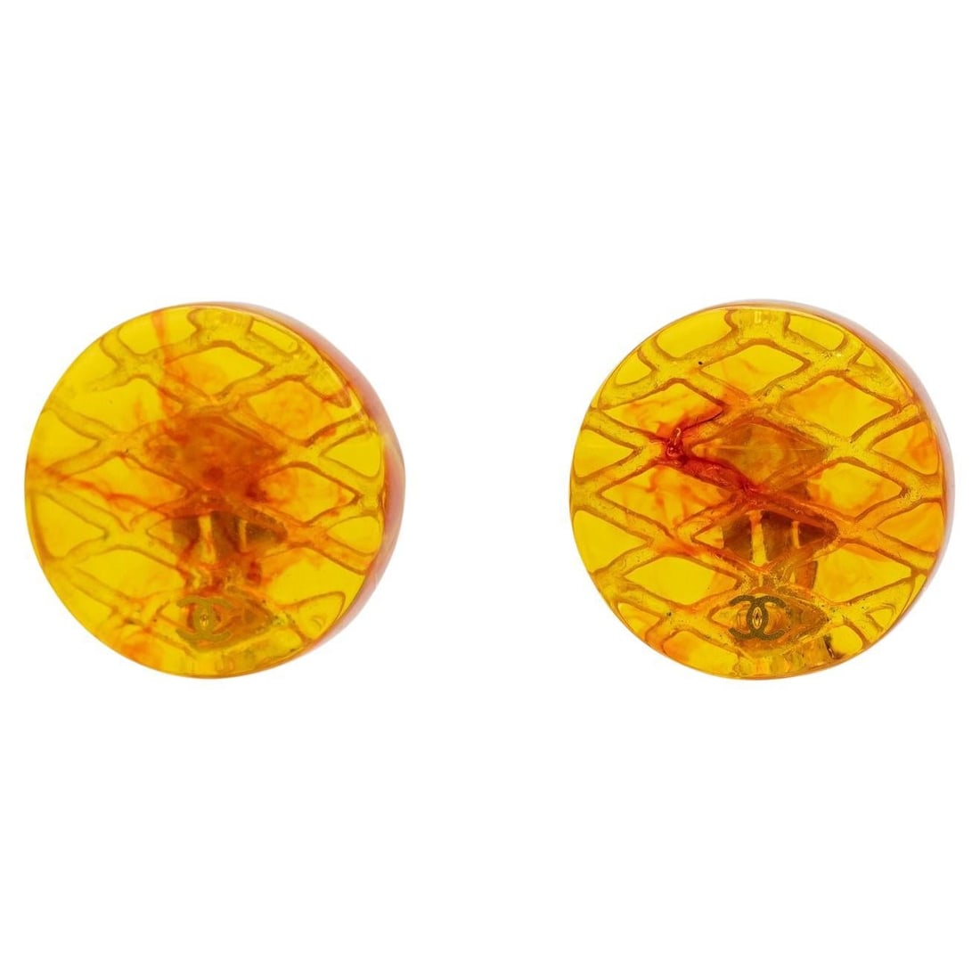 Chanel Lucite Clip On Earrings with Amber Round Cut Stone: Chanel Lucite Clip On Earrings with Amber Round Cut Stone Vintage Chanel clip-on earrings crafted of lucite with a small printed CC logo. The design features amber round-cut stones and was made in Ita