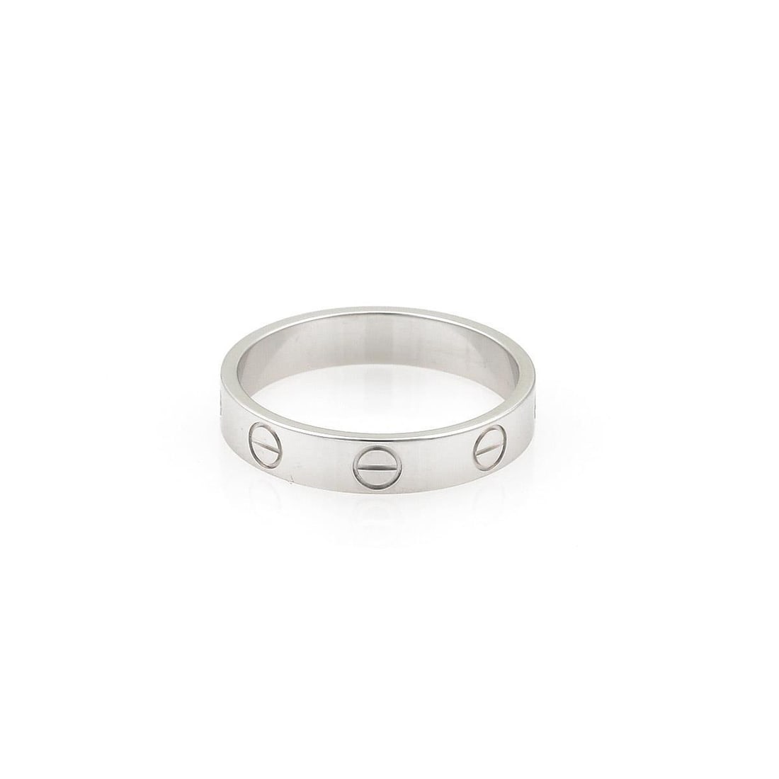 Cartier Mini Love 18k White Gold Band Ring 3.6mm Size 47 US 4.25: Cartier Mini Love 18k White Gold Band Ring 3.6mm Size 47 US 4.25 This exquisite band ring is from the esteemed MINI LOVE collection by Cartier. Crafted in luxurious 18k white gold, it features a high 