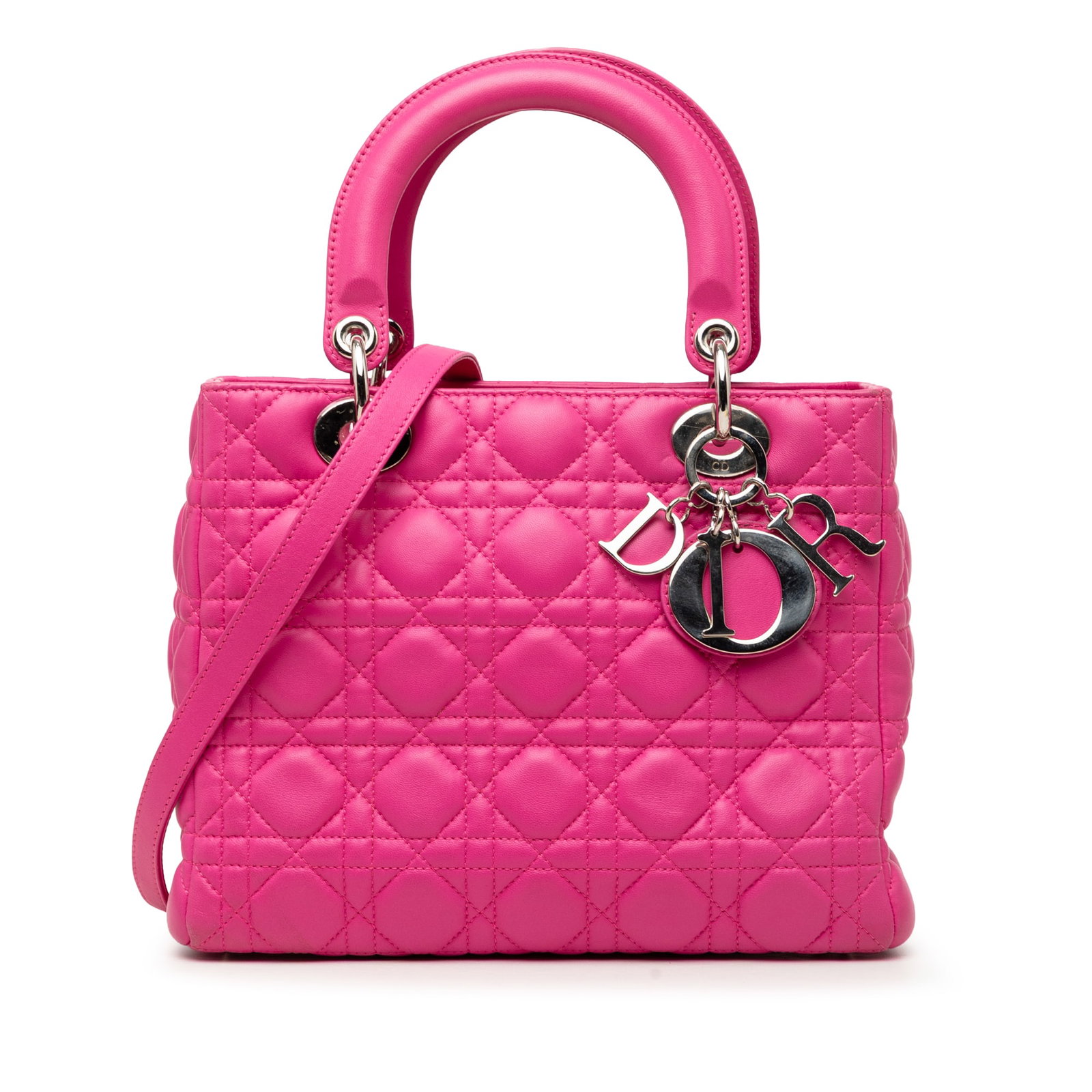 Dior Lady Dior Medium Pink Lambskin Cannage Handbag: Dior Lady Dior Medium Pink Lambskin Cannage Handbag The Lady Dior is a medium-sized handbag crafted in quilted lambskin leather with a pink finish. It features flat leather top handles, a detachable f
