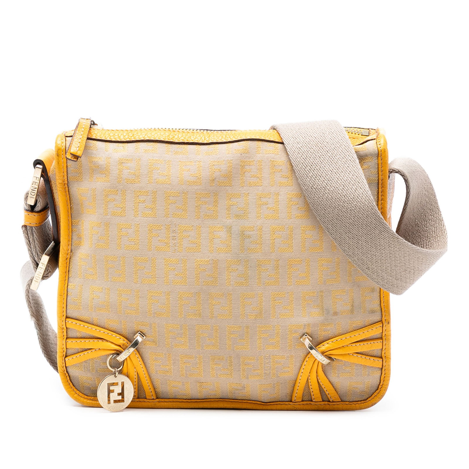 Fendi Zucchino F Charm Canvas Crossbody Bag Beige: Fendi Zucchino F Charm Canvas Crossbody Bag Beige Fendi Zucchino Canvas F Charm Crossbody bag with a canvas body, leather trim, an adjustable flat strap, top zip closure, and an interior slip pocket. 