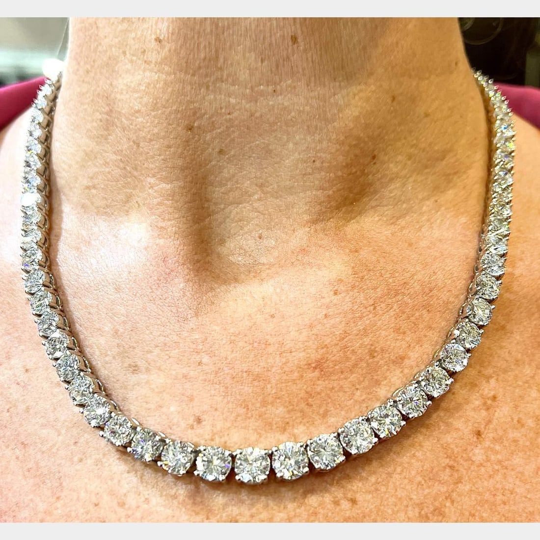 Platinum Riviera Necklace 50.26 Ct Diamonds GIA Certified Center Stone: Platinum Riviera Necklace 50.26 Ct Diamonds GIA Certified Center Stone This exquisite Platinum Riviera Necklace showcases a stunning total of 75 diamonds, weighing an impressive 50.26 carats. The cent