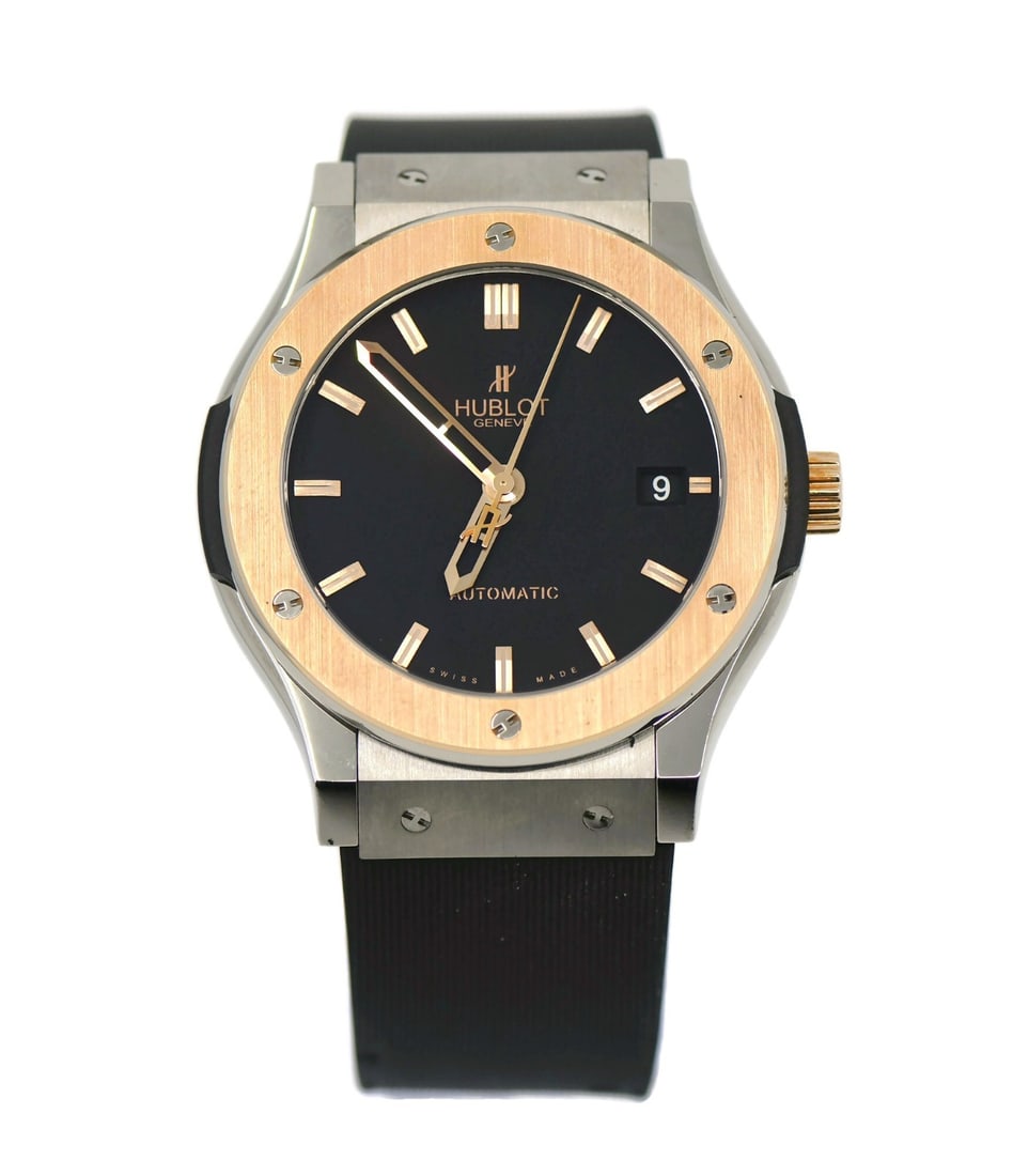 Hublot Classic Fusion 18K Gold Titanium 511.NO.1180.RX 45mm Automatic Watch: Hublot Classic Fusion 18K Gold Titanium 511.NO.1180.RX 45mm Automatic Watch This Hublot Classic Fusion wristwatch features a 45 mm case crafted from titanium with 18K accents. It has an automatic mech