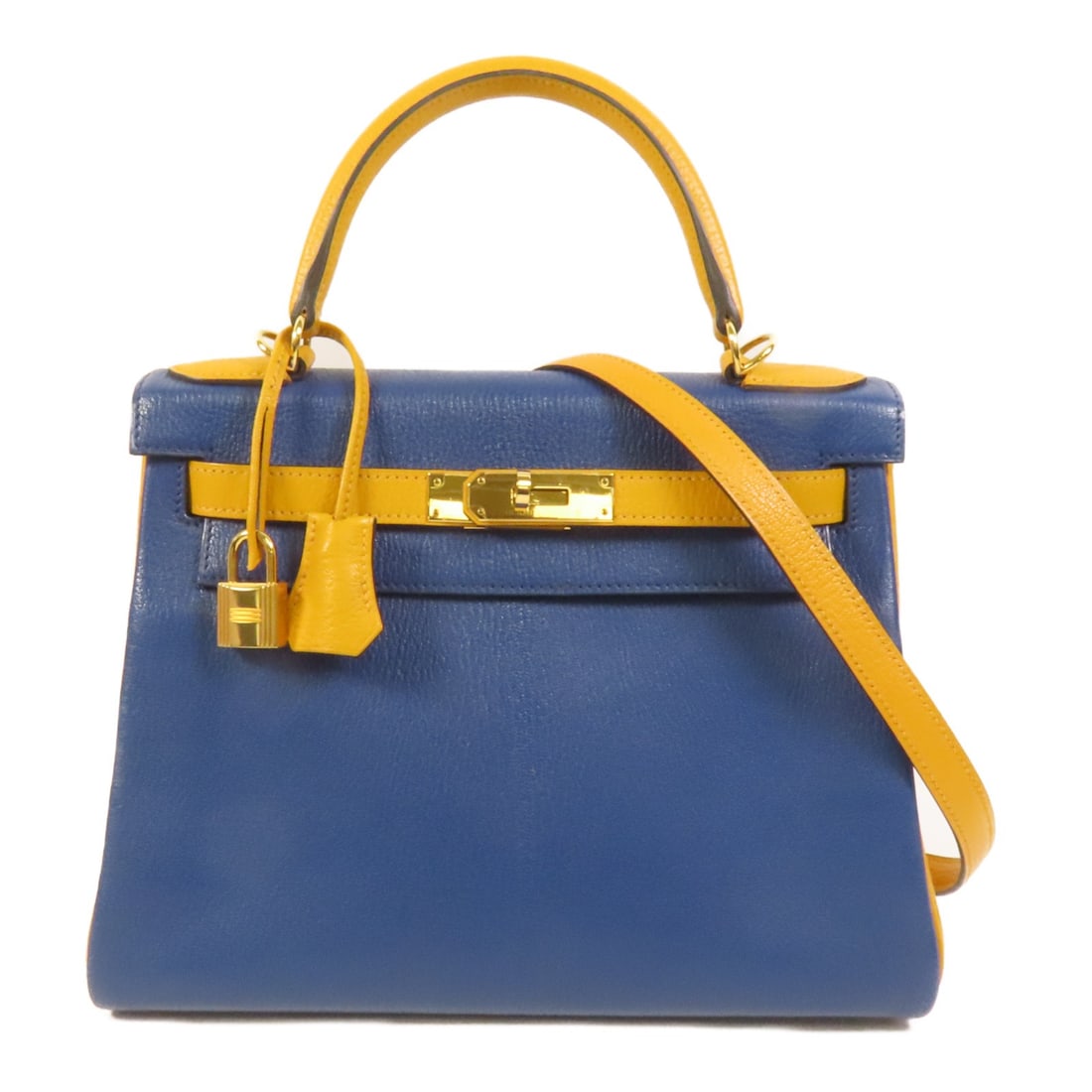 Hermes Kelly 28 Chevre 2 Way Bag Deep Blue Jaune Ambre: Hermes Kelly 28 Chevre 2 Way Bag Deep Blue Jaune Ambre A Hermes Kelly 28 2-way shoulder bag in Chevre leather, presented in deep blue with Jaune Ambre accents. The bag features a handle and shoulder s
