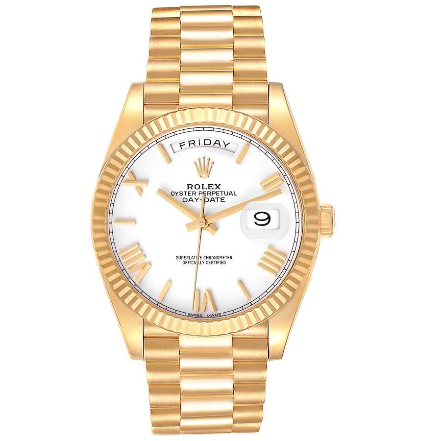 Rolex Day-Date 40 White Dial 228238 President Bracelet: Rolex Day-Date 40 White Dial 228238 President Bracelet This Rolex Day-Date 40 features a white dial with yellow gold Roman numeral markers, complemented by a fluted bezel and the iconic President brac
