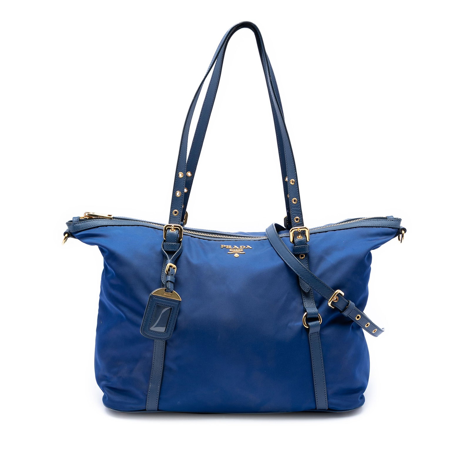Prada blue Tessuto satchel with leather trim: Prada blue Tessuto satchel with leather trim This Prada Saffiano Trimmed Tessuto Satchel features a blue nylon body with leather trim, flat leather handles, a detachable flat strap, a top zip closure,