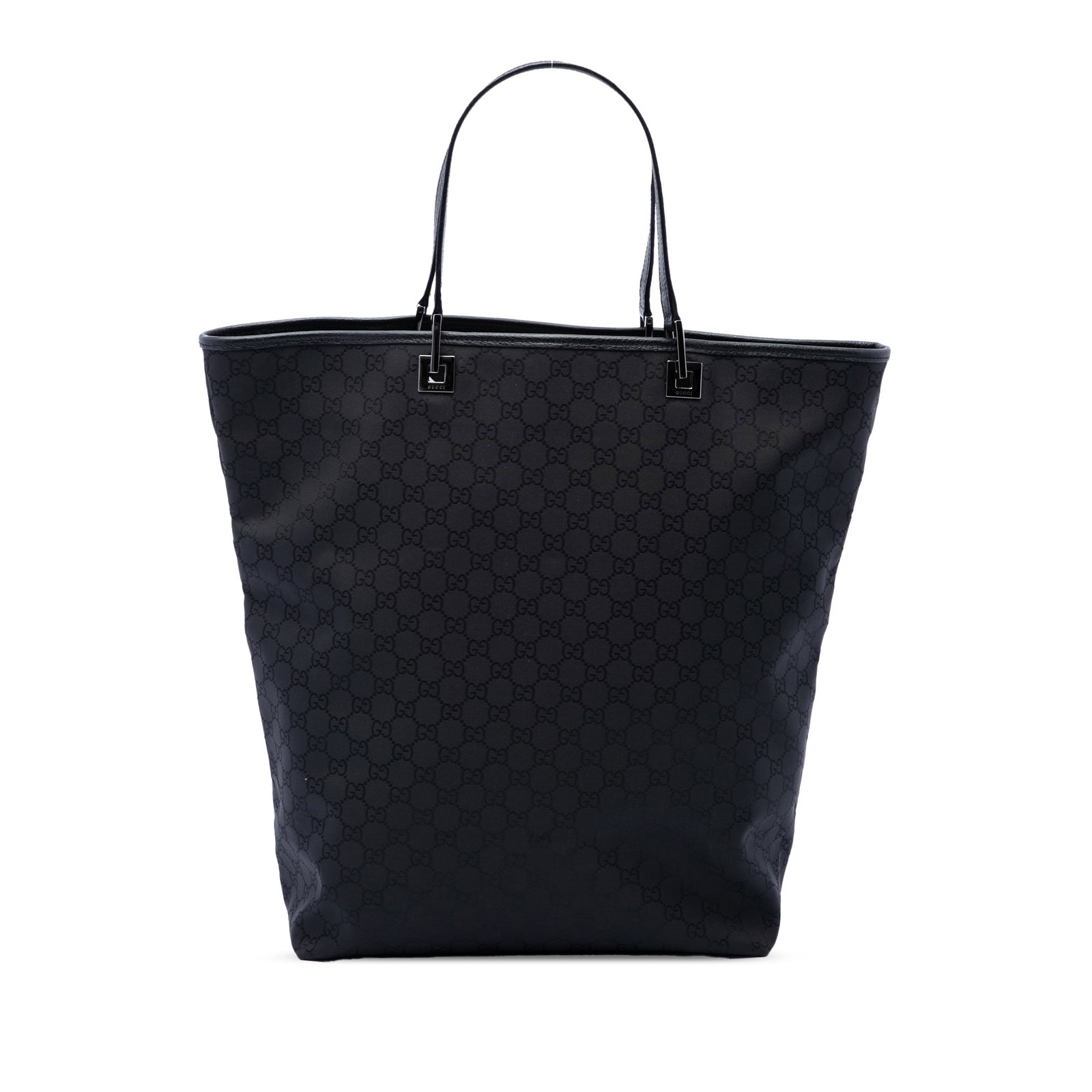 Gucci GG Canvas Tote Bag with Leather Trim Black: Gucci GG Canvas Tote Bag with Leather Trim Black Gucci GG Canvas Tote crafted with a canvas body and leather trim. It features flat leather handles, an open top, and an interior zip pocket. Condition 