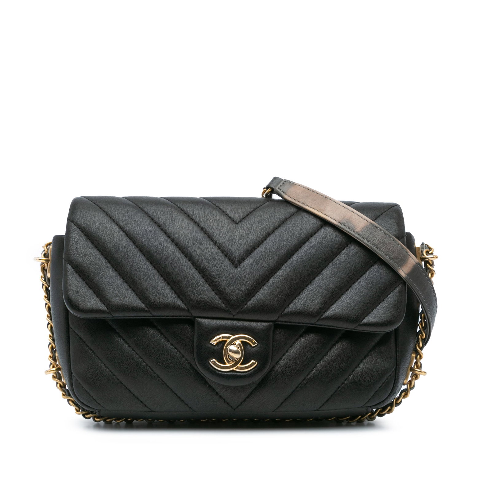 Chanel Mini Rectangular Chevron Flap Bag Black Lambskin: Chanel Mini Rectangular Chevron Flap Bag Black Lambskin This Chanel Mini Rectangular Chevron Flap Bag is crafted from luxurious quilted lambskin leather in a classic black hue. It features a stylish l