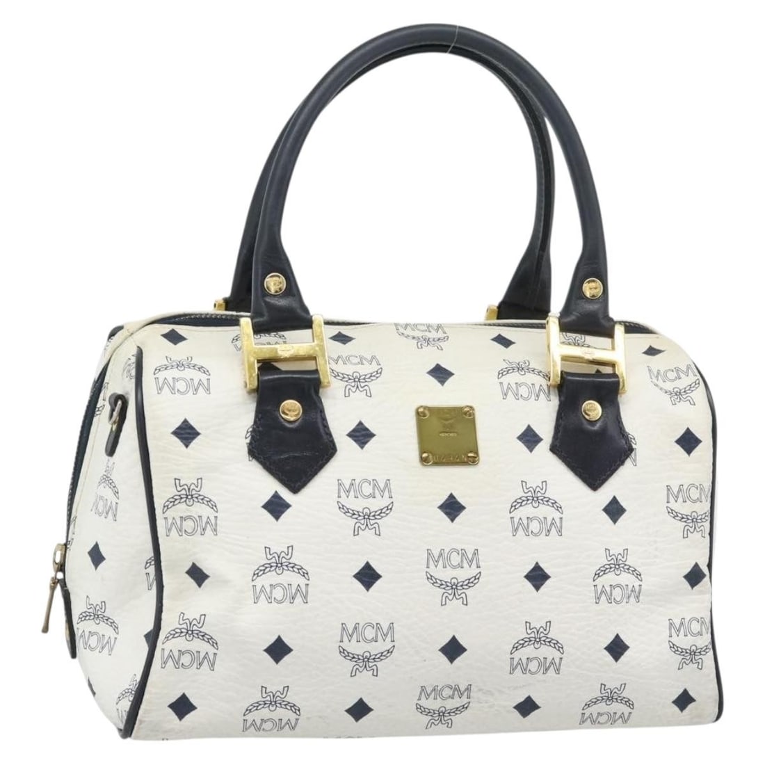 MCM Vicetos PVC Leather Handbag White Gold Tone Germany: MCM Vicetos PVC Leather Handbag White Gold Tone Germany MCM hand bag in PVC leather with a white and gold colorway, made in Germany. The bag measures approximately 10.6 x 5.9 x 5.5 inches with a handl