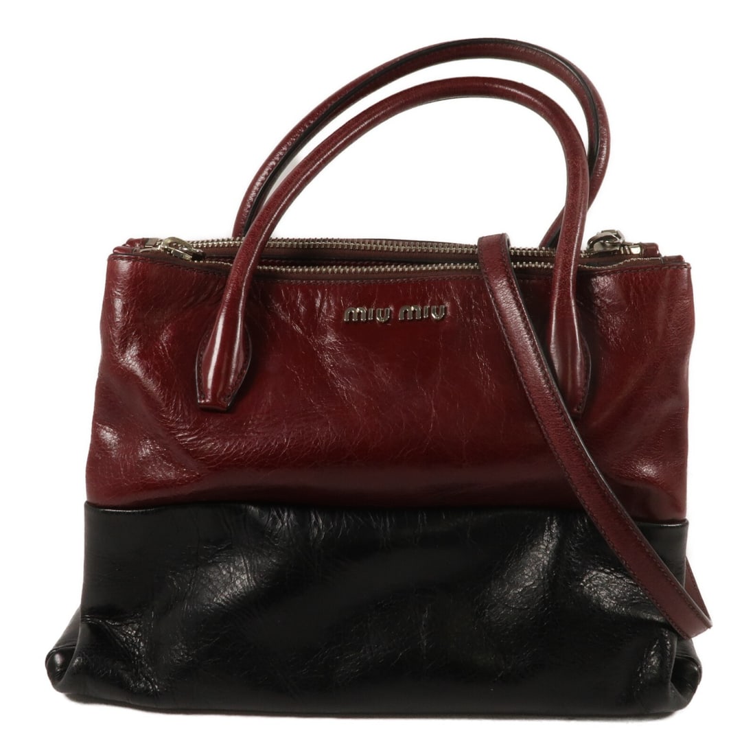 Miu Miu 2Way Shoulder Bag Red Black Calfskin Leather SHW: Miu Miu 2Way Shoulder Bag Red Black Calfskin Leather SHW This Miu Miu 2-way shoulder bag is crafted from high-quality calfskin leather in a striking red color with black accents. Designed for versatil