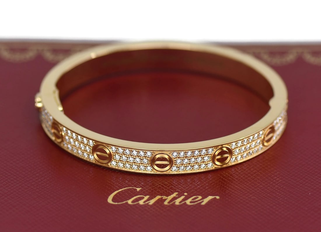 Cartier Love Pave Diamond Bracelet 18K Yellow Gold Size 16: Cartier Love Pave Diamond Bracelet 18K Yellow Gold Size 16 Pre-owned Cartier Love bracelet in 18k yellow gold with a pave diamond design. This bangle-style bracelet is size 16 and comes with the purch