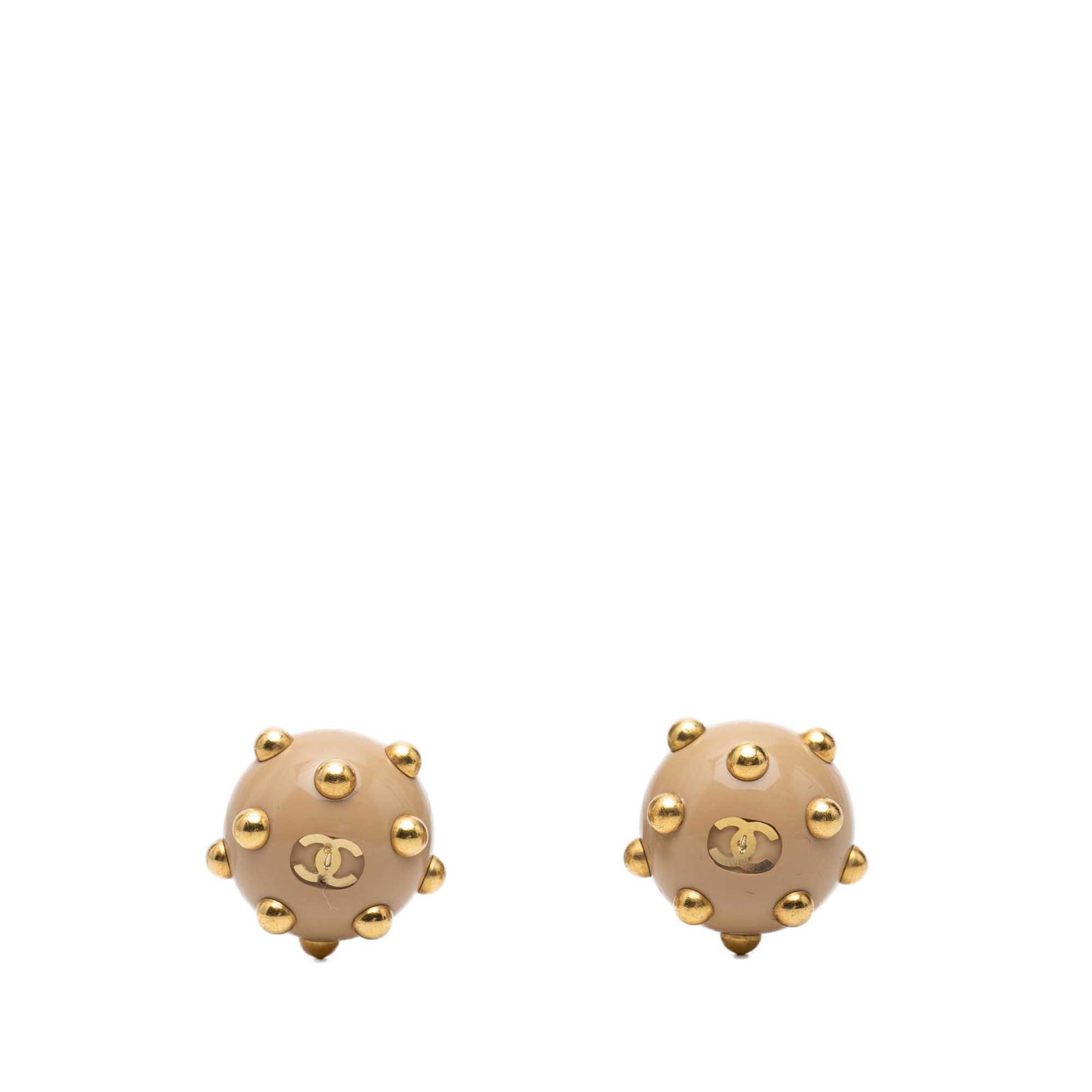 Chanel CC Clip On Stud Earrings Resin Gold Plated: Chanel CC Clip On Stud Earrings Resin Gold Plated Chanel CC resin and gold-plated studded clip-on earrings in beige. These costume earrings feature resin bodies with gold-tone studs and back clip-on c