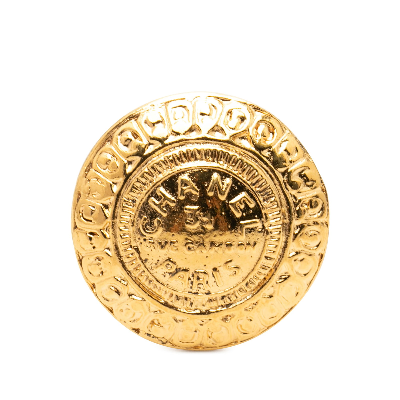 Chanel 31 Rue Cambon Gold Plated Round Brooch: Chanel 31 Rue Cambon Gold Plated Round Brooch This Chanel brooch showcases a classic round design crafted from gold-plated metal and features a secure back pin closure. Made in France, it displays the