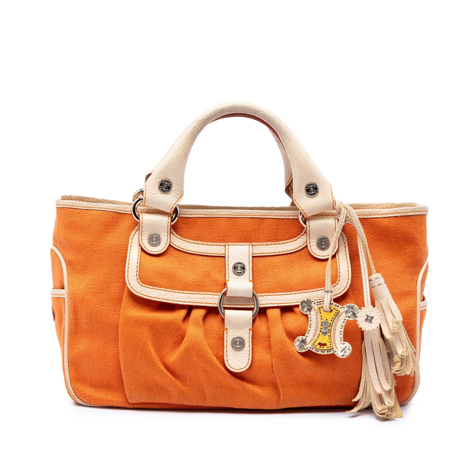Celine orange canvas Boogie tote with leather trim: Celine orange canvas Boogie tote with leather trim This Celine Canvas Boogie Handbag features a durable canvas body accented with leather trim and rolled leather handles. It includes an open top for e