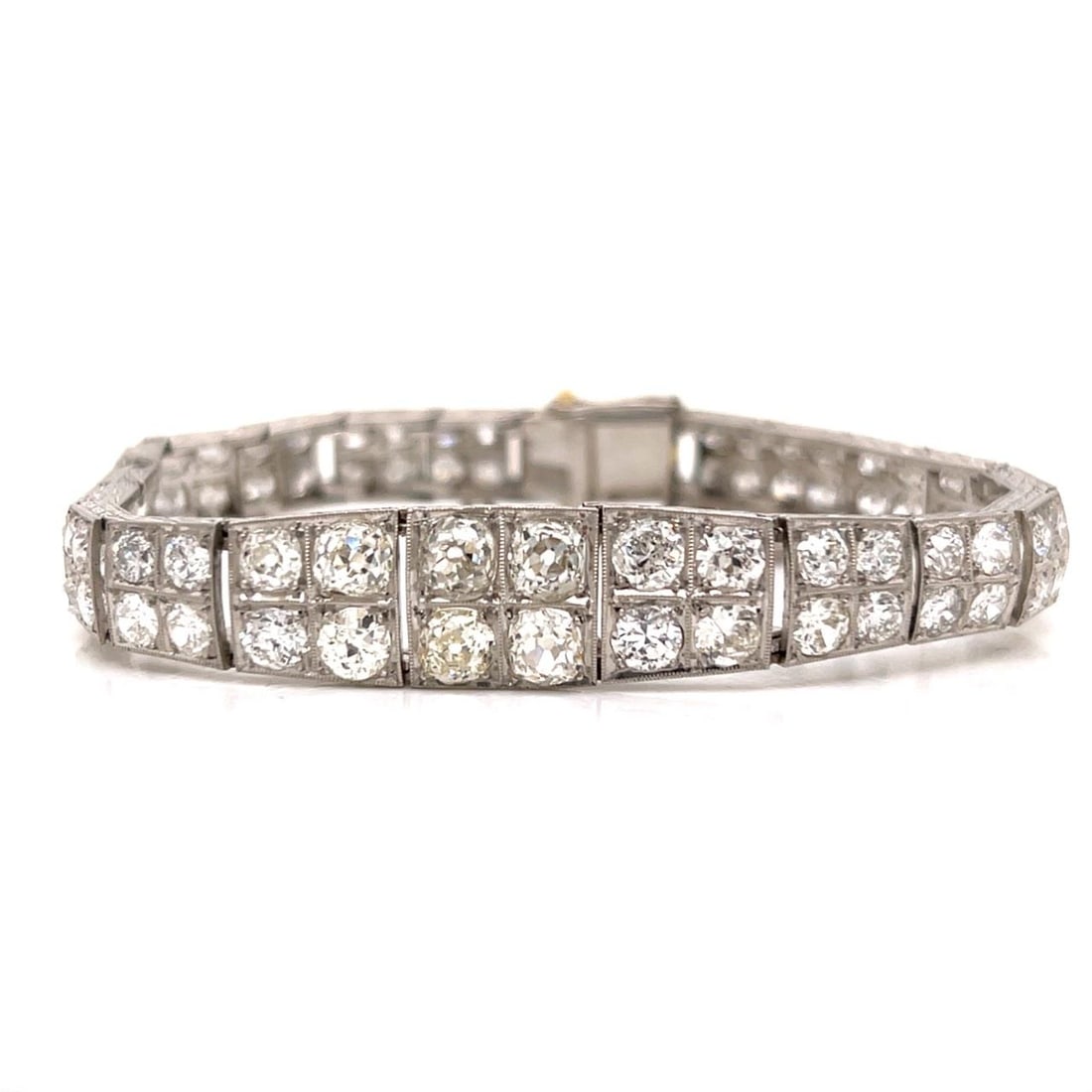 Platinum Art Deco Diamond Bracelet with 13 Carats Old Mine Stones: Platinum Art Deco Diamond Bracelet with 13 Carats Old Mine Stones This Art Deco platinum bracelet features 86 Old Mine cut diamonds with a total approximate weight of 13.00 carats, graded G-H for colo