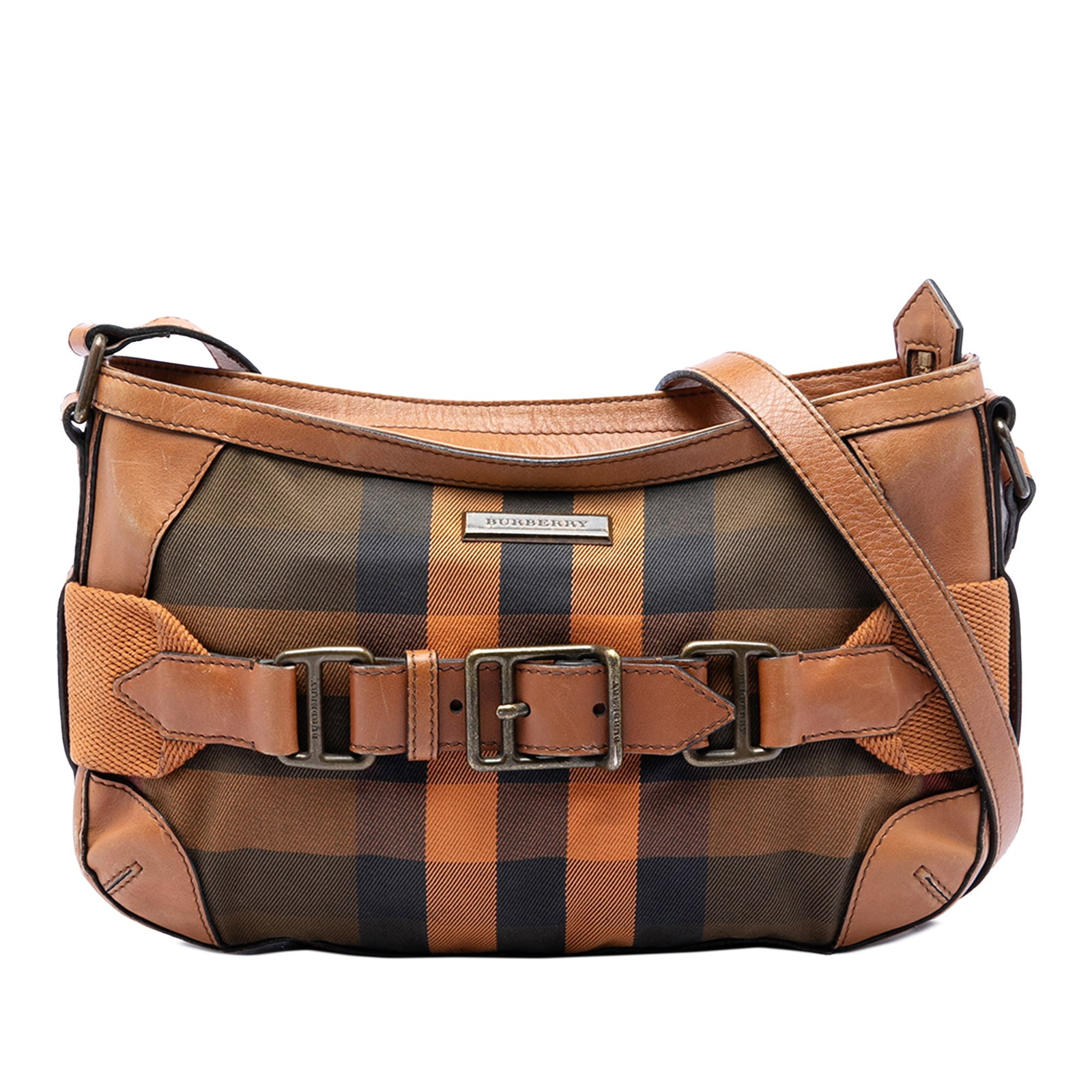 Burberry Mega Check canvas belted crossbody bag: Burberry Mega Check canvas belted crossbody bag This Burberry crossbody bag features the signature mega check canvas complemented by leather belt accents. It is designed with an adjustable flat leathe
