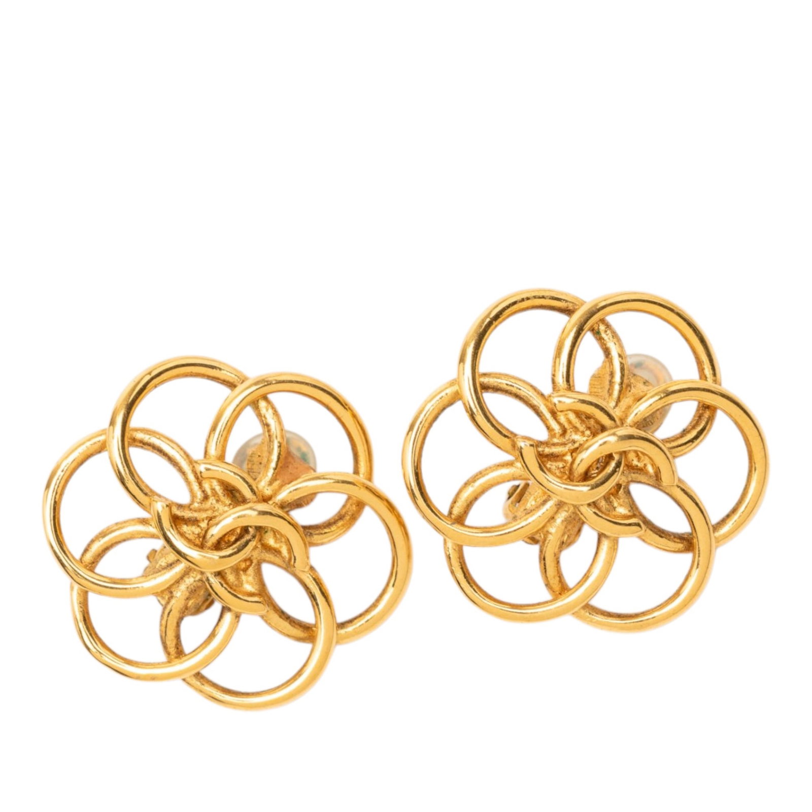 Chanel Gold Plated CC Flower Hoop Clip Earrings: Chanel Gold Plated CC Flower Hoop Clip Earrings These Chanel CC Gold Plated Flower Hoop Clip-On Earrings feature a gold-plated metal construction with an elegant floral hoop design. Made in France, th