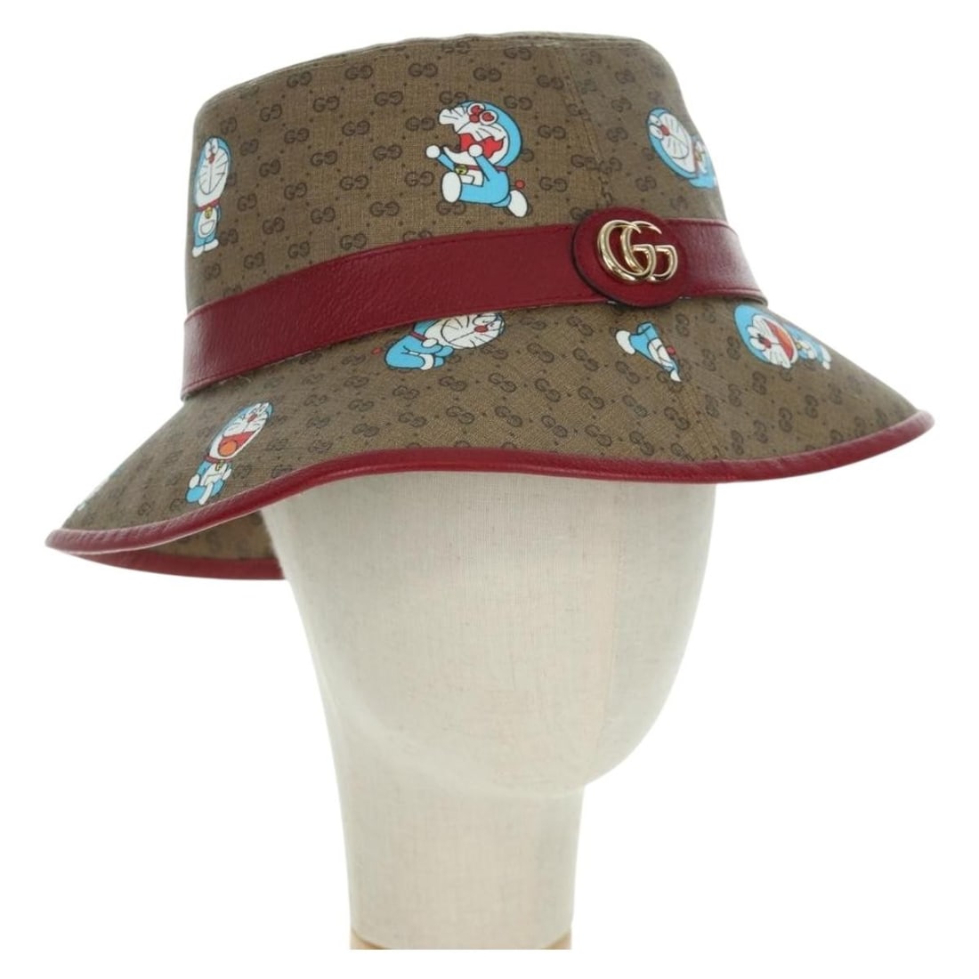Gucci Doraemon Brown Bucket Hat Micro GG Supreme Canvas: Gucci Doraemon Brown Bucket Hat Micro GG Supreme Canvas A Gucci x Doraemon bucket hat in brown Micro Small GG Canvas, made in Italy. It comes with a dust bag and shopping bag. The hat is described as 