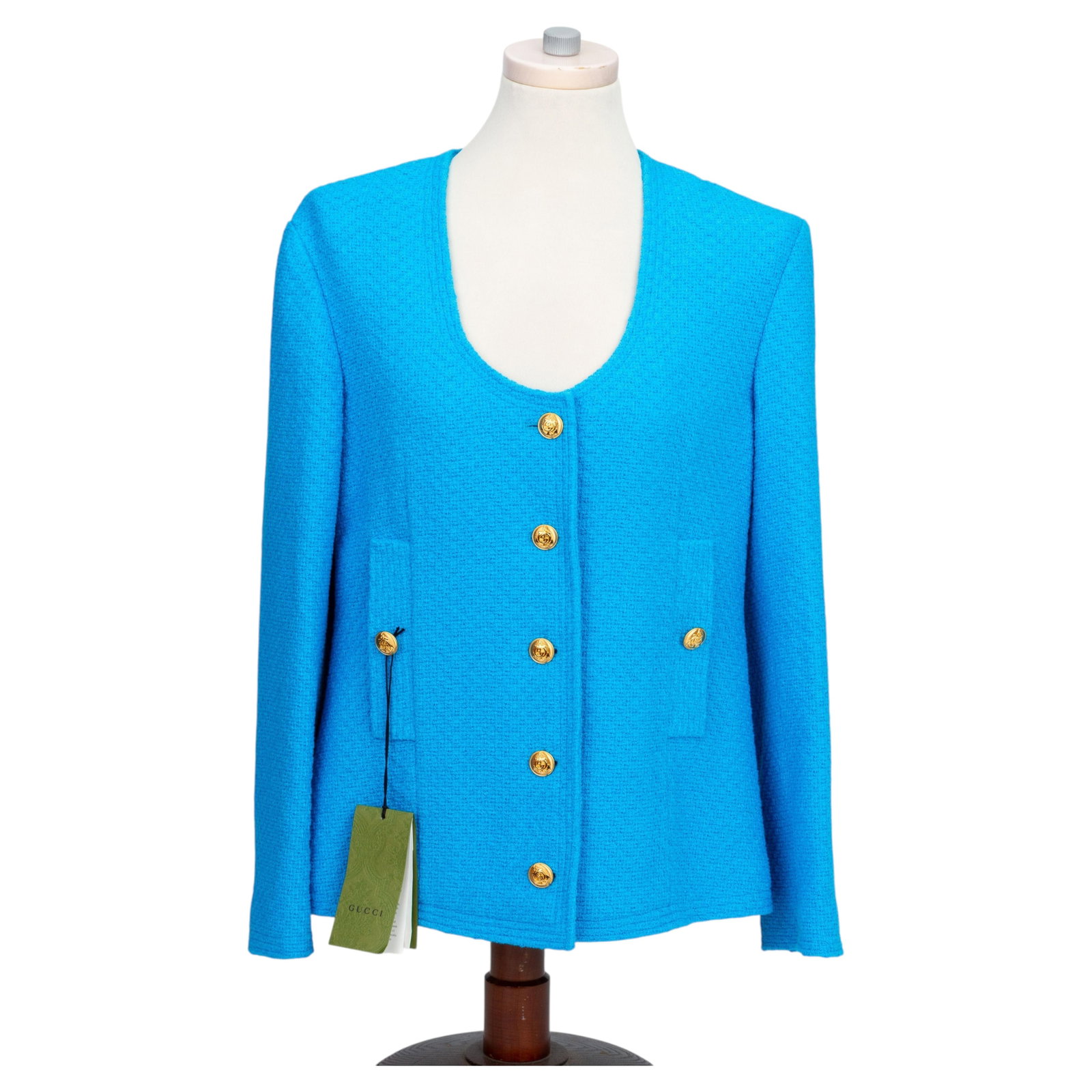Turquoise Tweed Gucci Jacket with Gold Buttons New with Tags Size 44: Turquoise Tweed Gucci Jacket with Gold Buttons New with Tags Size 44 This Gucci turquoise tweed jacket features accent gold buttons and a loose fit. It is un-used with original tags attached, made in 