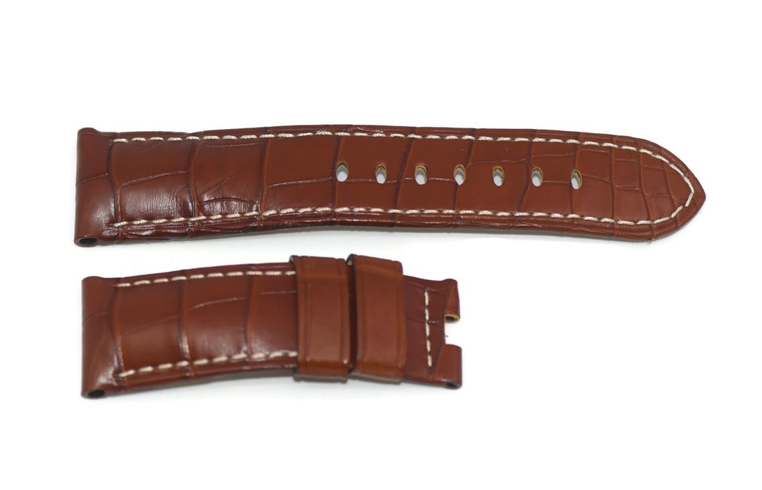 Panerai Authentic Brown Leather Watch Strap 24mm: Panerai Authentic Brown Leather Watch Strap 24mm Enhance your timepiece with this authentic Panerai brown leather strap. Designed specifically for wristwatches, this strap features a width of 24mm at 
