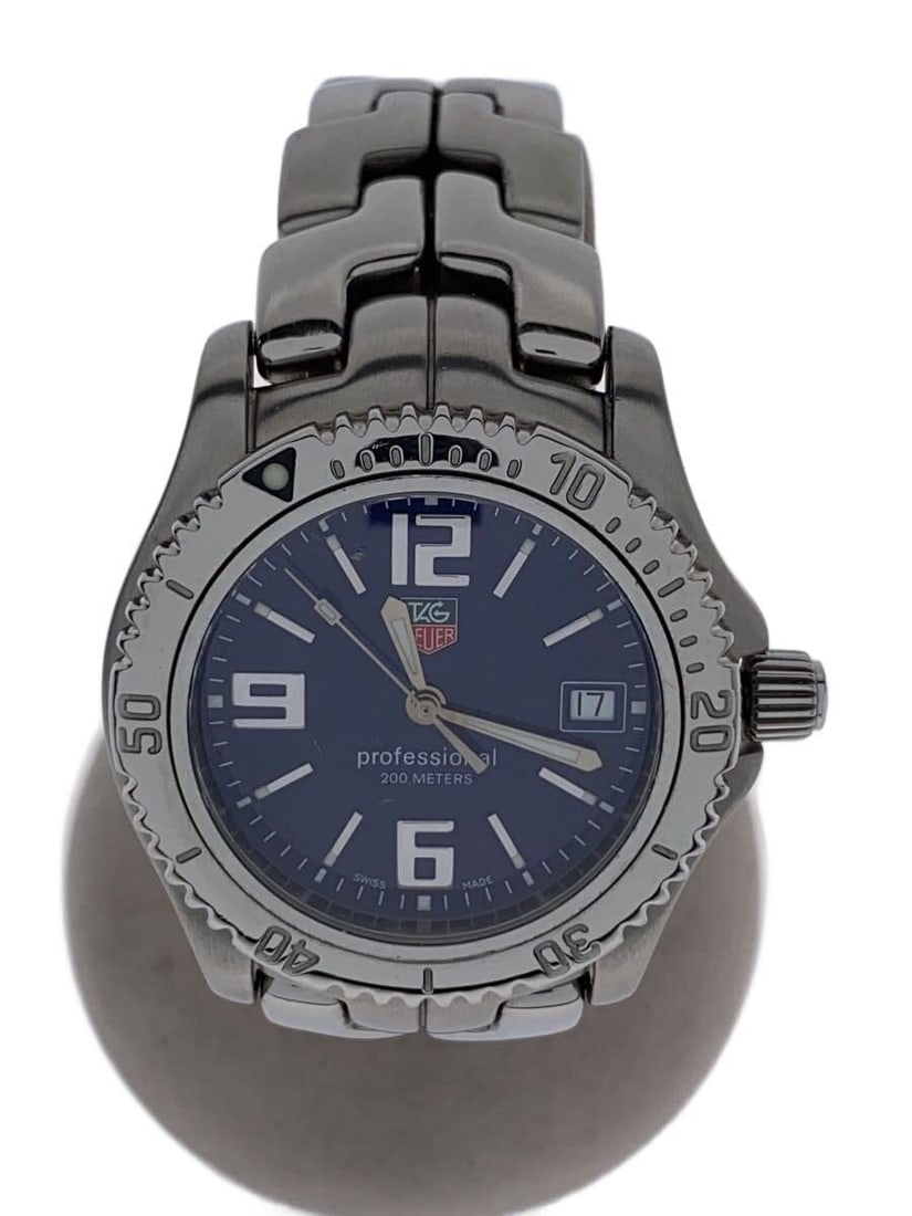 TAG Heuer stainless steel men's wristwatch WT1213: TAG Heuer stainless steel men's wristwatch WT1213 This TAG Heuer Professional 200m WT1213 men's wristwatch features a stainless steel case and band in an indigo color. Designed for durability, it show