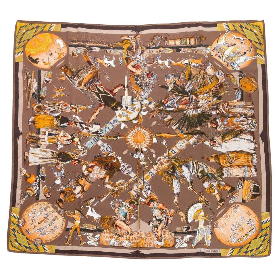 Hermes Les Danses Des Indiens Silk Scarf by Kermit Oliver 35 Inch: Hermes Les Danses Des Indiens Silk Scarf by Kermit Oliver 35 Inch The Hermes "Les Danses Des Indiens" scarf showcases ritual dances from various Indian tribes, created by American artist Kermit Oliver