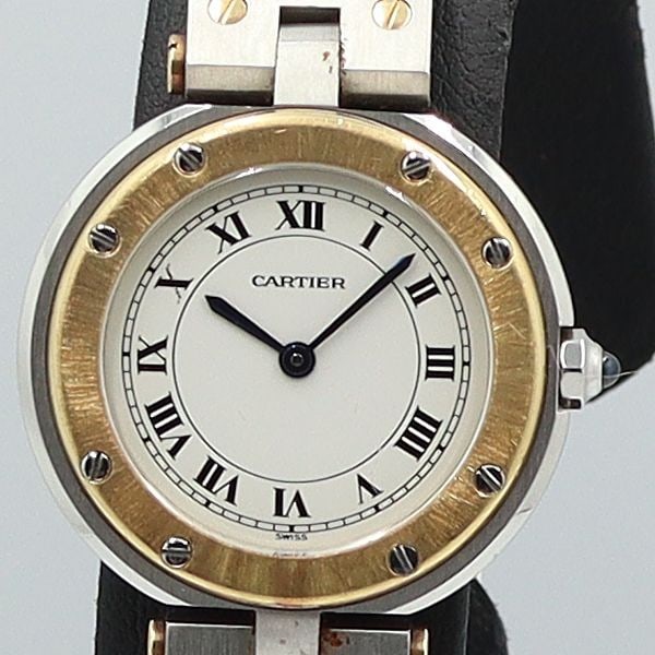 Cartier Santos Round Ladies Quartz Watch YG SS Roman Dial 9788ABC: Cartier Santos Round Ladies Quartz Watch YG SS Roman Dial 9788ABC Pre-owned Cartier Santos Round ladies wristwatch with a quartz movement, Roman numeral dial, and a combination of yellow gold and stai