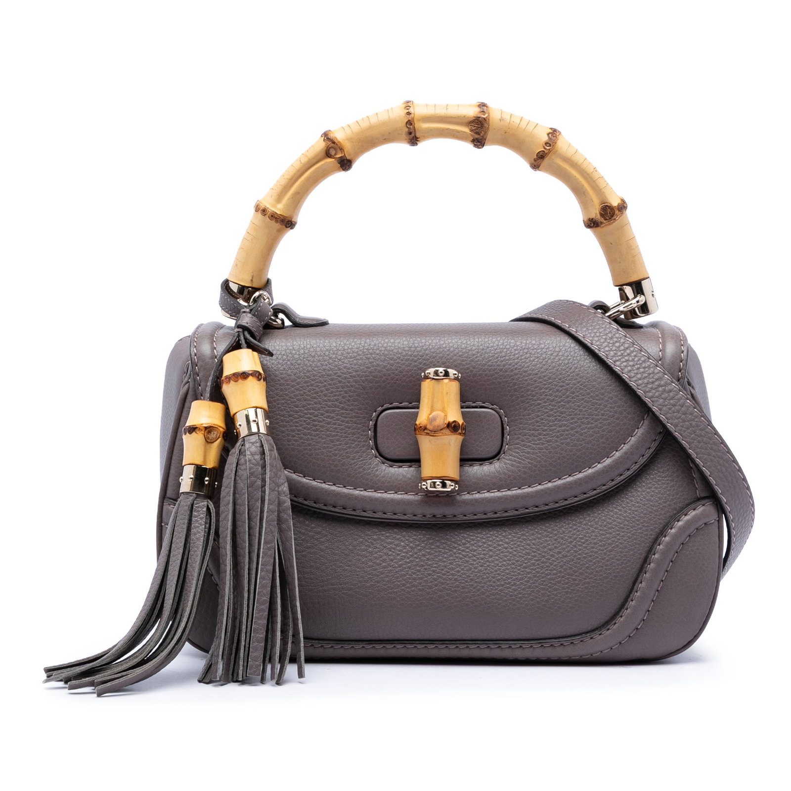 Gucci New Bamboo Medium Leather Satchel Bag Brown: Gucci New Bamboo Medium Leather Satchel Bag Brown Medium leather satchel with a structured silhouette, bamboo top handle, bamboo tassel details, and a detachable flat strap. The front flap secures wit
