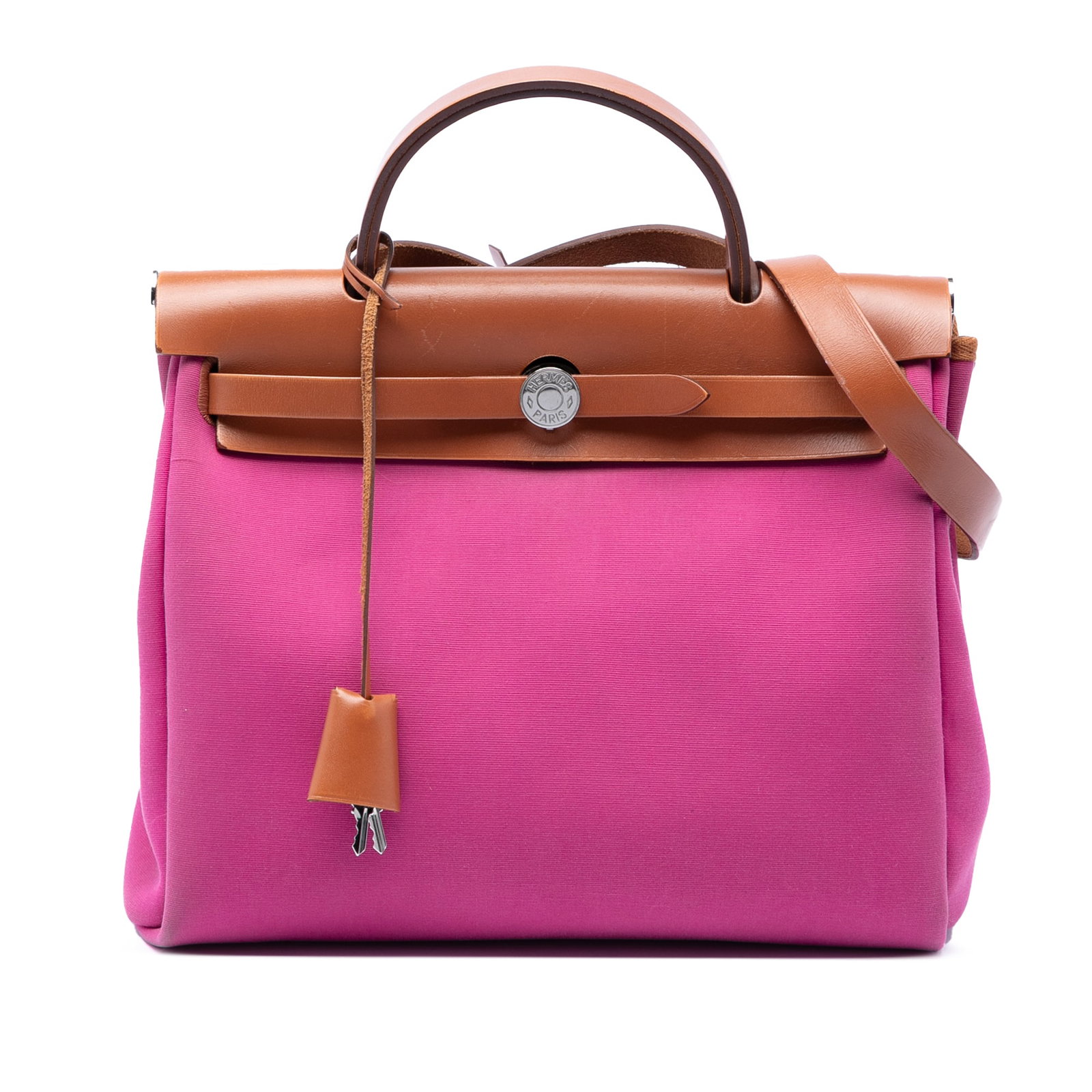 Hermes Herbag Zip 31 Pink Fabric Bag: Hermes Herbag Zip 31 Pink Fabric Bag The Hermes Toile Verso Herbag Zip 31 is a stylish handbag crafted with a durable canvas body and accented by leather details. It features a flat leather top handle