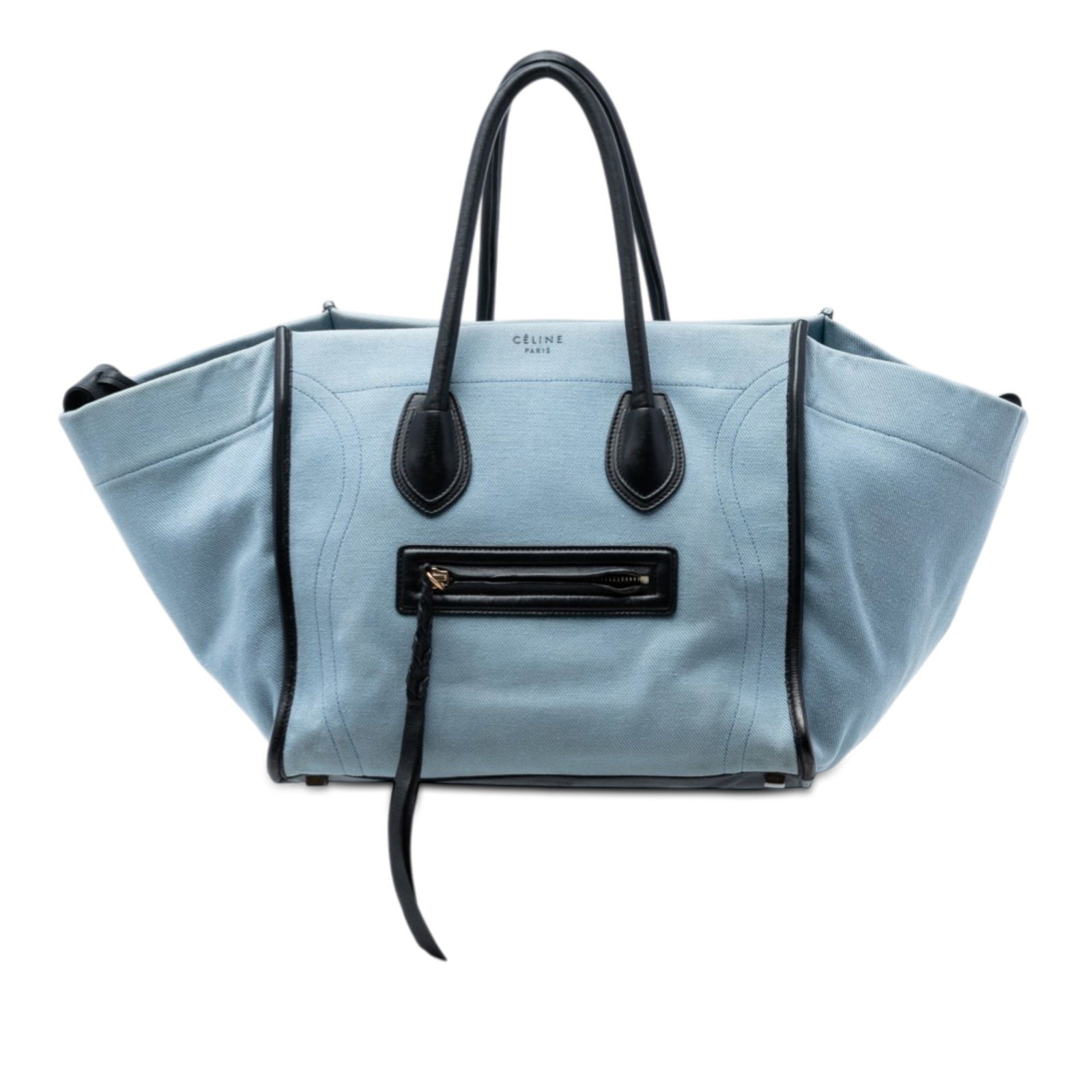 Celine Denim Phantom Luggage Tote Medium Blue: Celine Denim Phantom Luggage Tote Medium Blue This Celine Medium Denim Phantom Luggage Tote features a blue denim fabric body complemented by rolled leather handles. The bag is designed with an open t