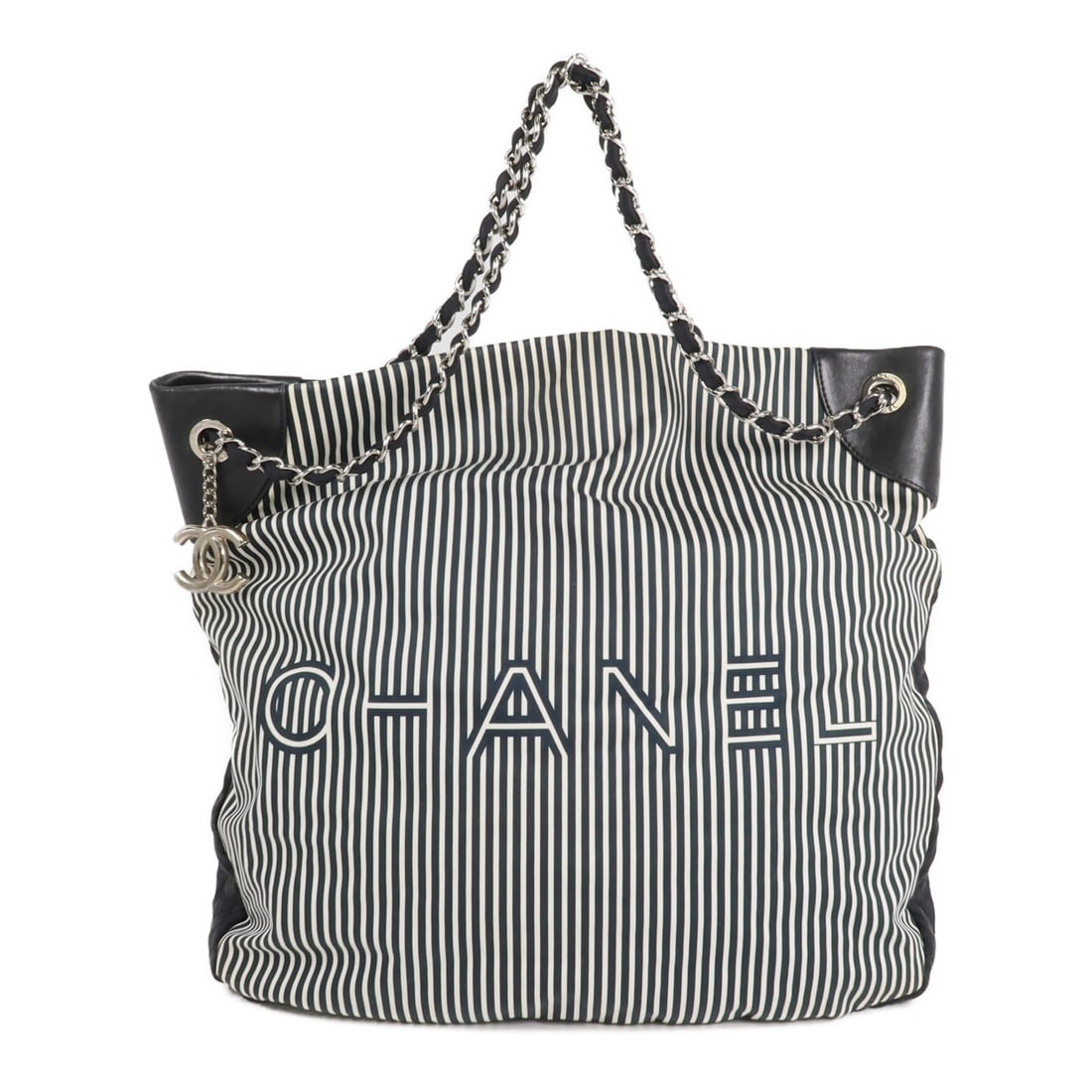 CHANEL CC canvas tote shoulder bag 2 way black white SHW: CHANEL CC canvas tote shoulder bag 2 way black white SHW A CHANEL CC SHW 2 Way Shoulder Tote Bag in black and white canvas. This tote features a two-way shoulder design, a magnetic pocket, and multipl