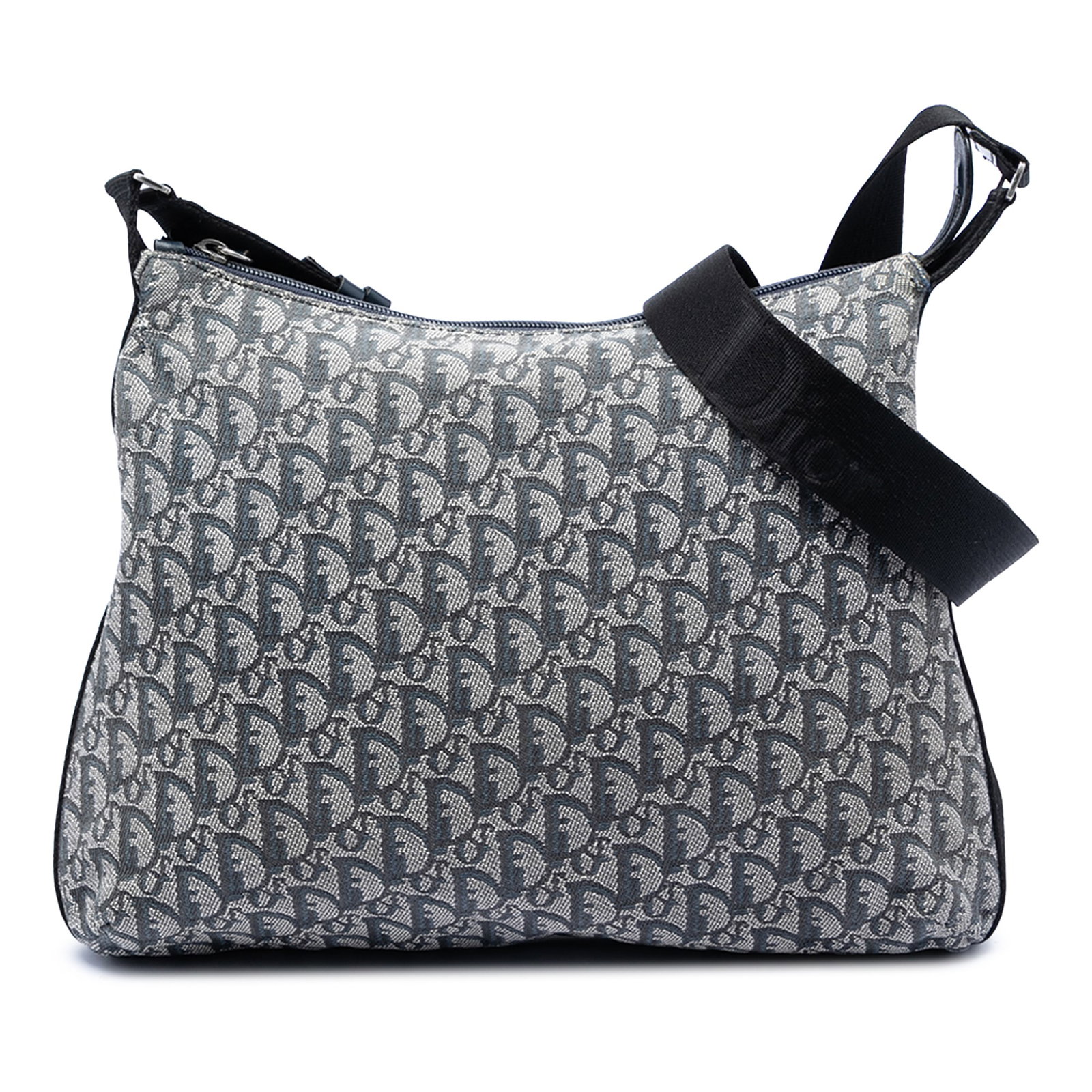 Dior Diorissimo Trotter Blue Canvas Adjustable Shoulder Bag: Dior Diorissimo Trotter Blue Canvas Adjustable Shoulder Bag This Diorissimo Trotter Canvas Crossbody bag features a blue canvas body with an adjustable flat shoulder strap, a top zip closure, and an i
