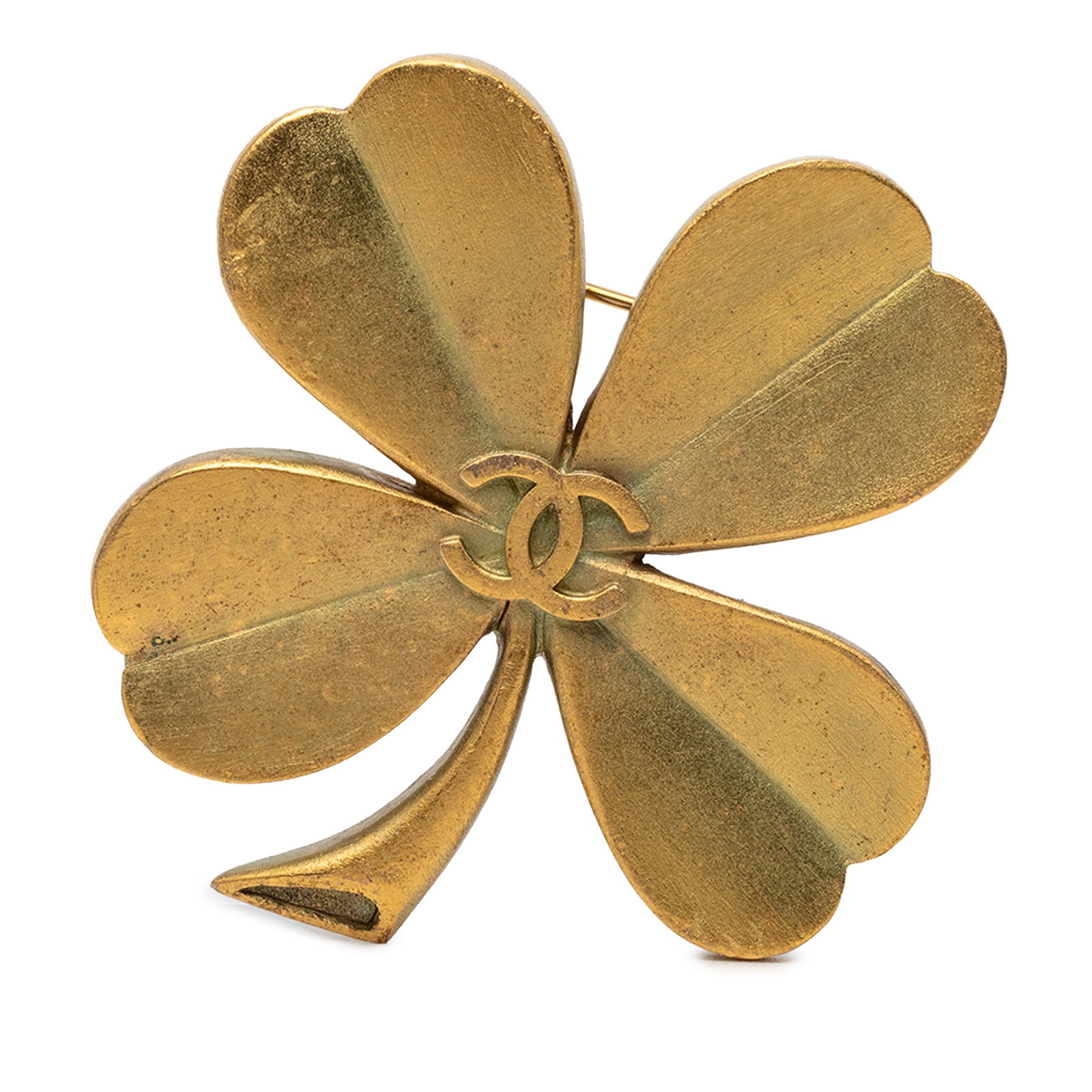 Chanel CC Clover Brooch Gold Plated Metal: Chanel CC Clover Brooch Gold Plated Metal Gold plated metal brooch in a clover design with a CC motif and back pin closure. Made in France and categorized as costume jewelry. The piece is finished in 