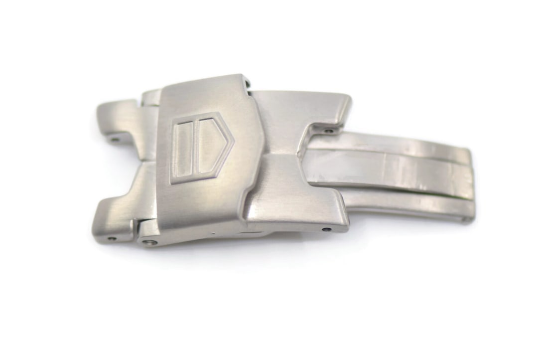 TAG Heuer Authentic Stainless Steel Deployment Buckle BA0550: TAG Heuer Authentic Stainless Steel Deployment Buckle BA0550 Enhance your TAG Heuer watch with this authentic stainless steel deployment buckle. Designed specifically for the Tag Heuer BA0550 model, t