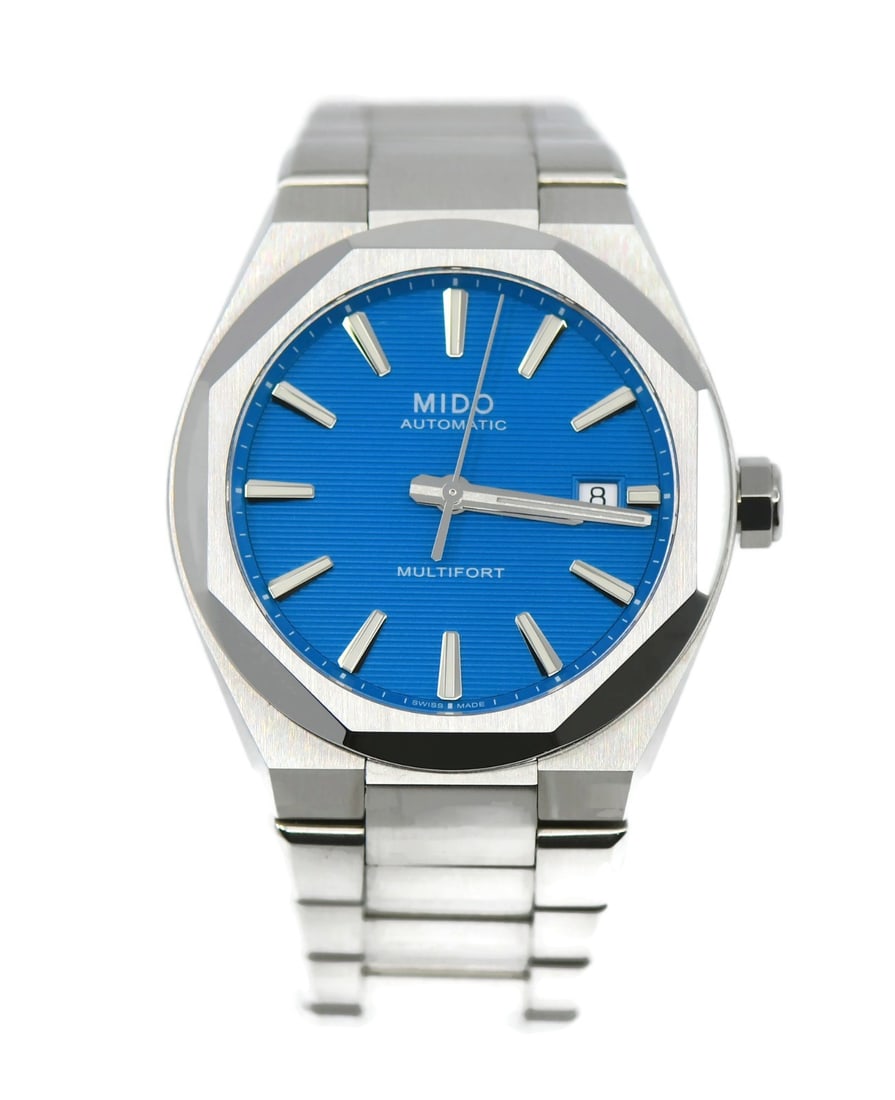 Mido Multifort blue dial automatic wristwatch ref M055.507.11.041.00: Mido Multifort blue dial automatic wristwatch ref M055.507.11.041.00 Mido Multifort stainless steel wristwatch with a round silver case and silver bracelet. It features a blue analog dial with stick i