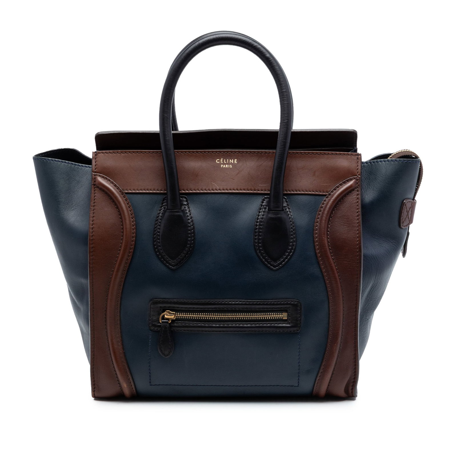 Celine Mini Luggage Tote Tricolor Blue Leather Bag: Celine Mini Luggage Tote Tricolor Blue Leather Bag Celine Mini Tricolor Leather Luggage Tote in blue leather, featuring rolled leather handles, a top zip closure, an exterior front zip pocket, and int