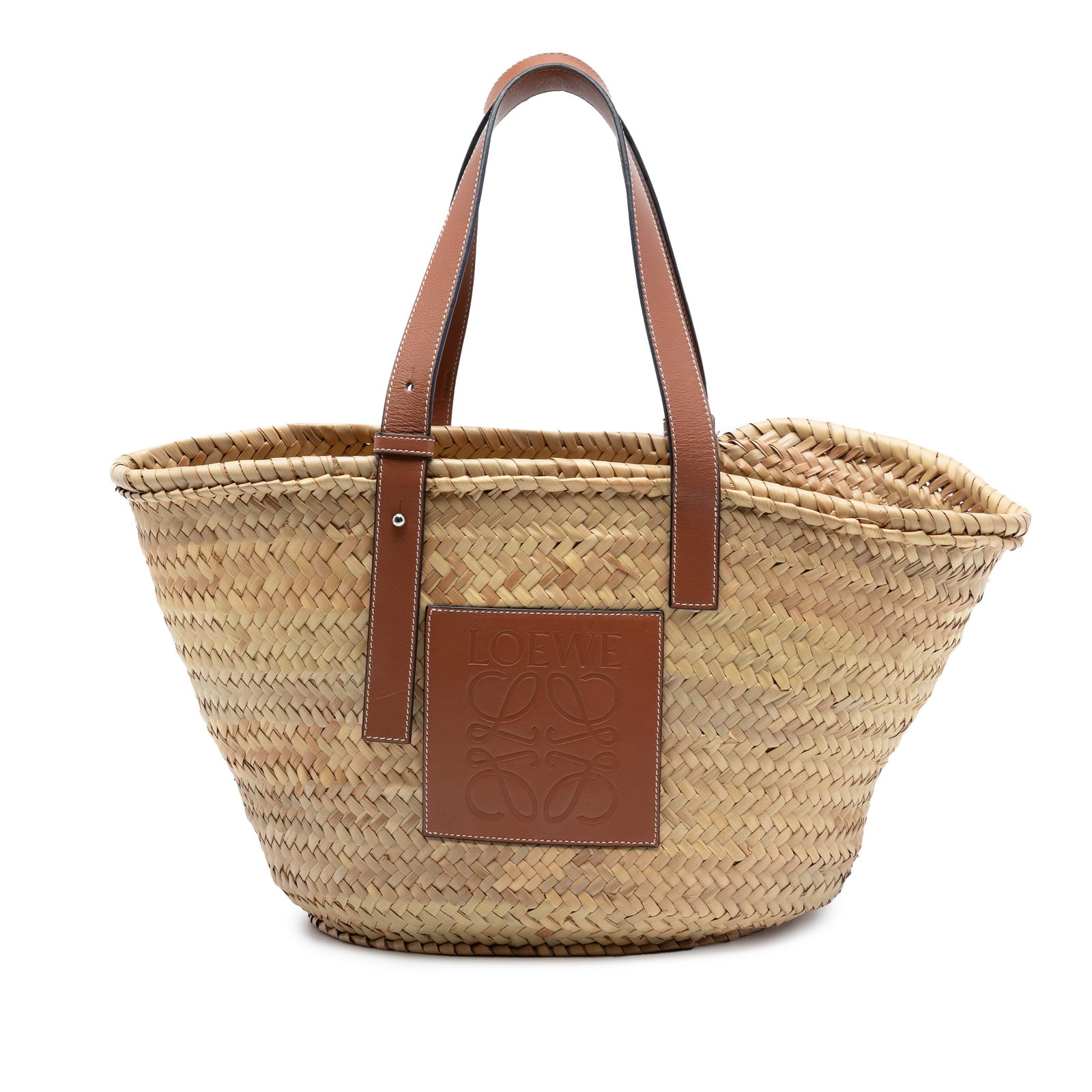 LOEWE Anagram Basket Tote Medium Raffia and Leather Bag: LOEWE Anagram Basket Tote Medium Raffia and Leather Bag This medium basket tote bag features a raffia and leather body, adjustable flat leather shoulder straps, and an open top. It is made in Spain an