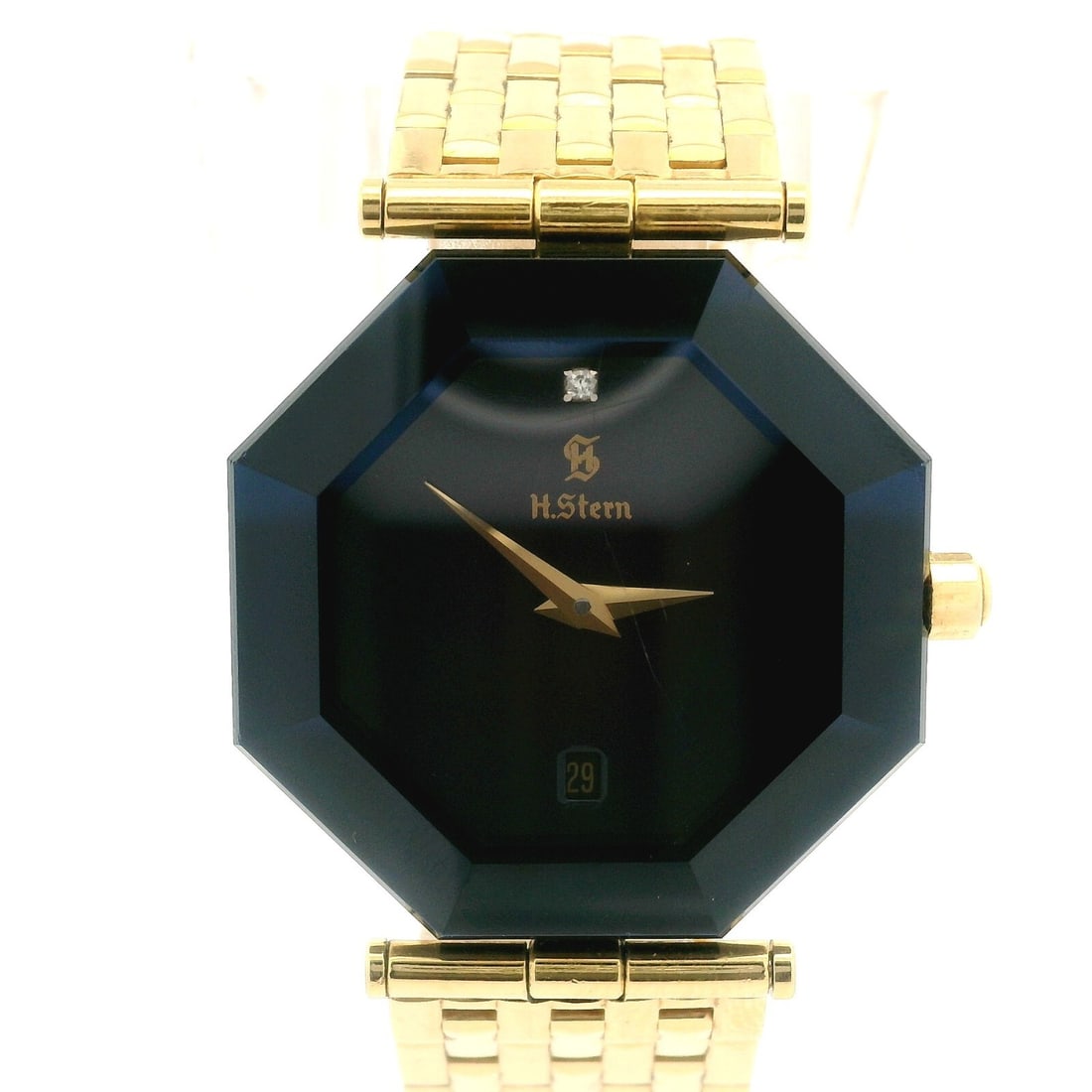 Vintage H. Stern 18k Yellow Gold Octagon Blue Safira Watch Bracelet: Vintage H. Stern 18k Yellow Gold Octagon Blue Safira Watch Bracelet This exquisite Vintage H. Stern wristwatch features a stunning octagon case crafted from 18k yellow gold, complemented by a faceted 