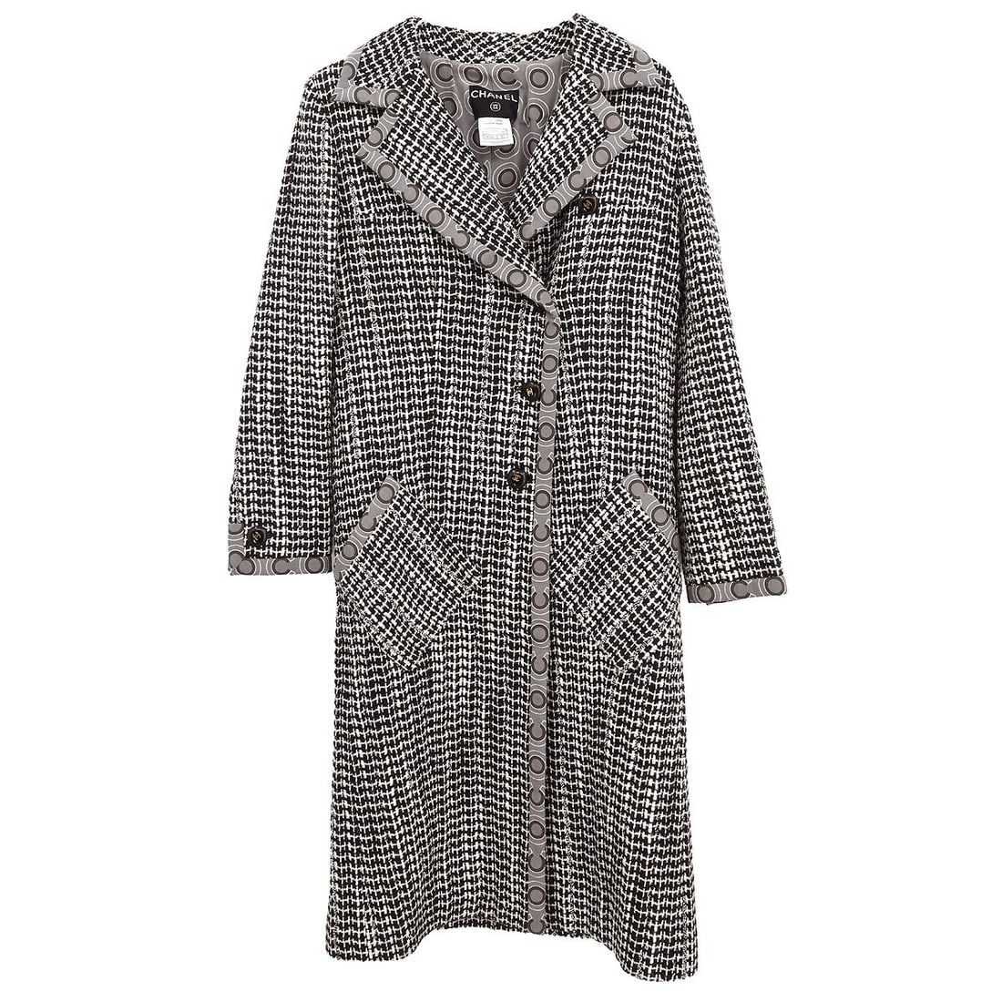 Vintage Chanel Brown Long Coat Size 36 France: Vintage Chanel Brown Long Coat Size 36 France Vintage Chanel brown long coat with a collared design, long sleeves, and button closure. This women's jacket features logo-accented buttons, a regular fit